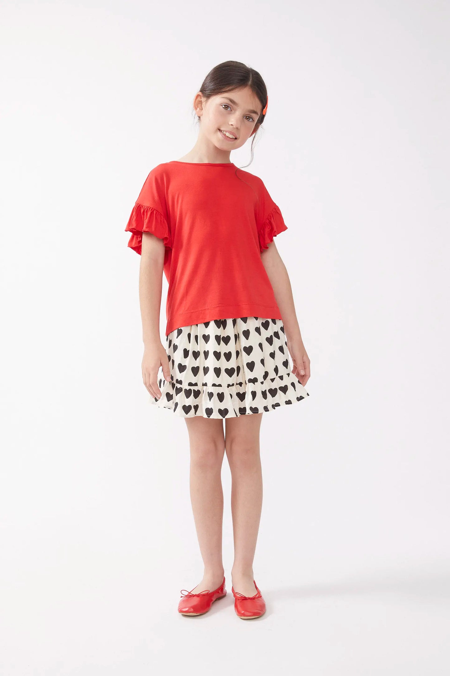 Top da bambina con volant rossi