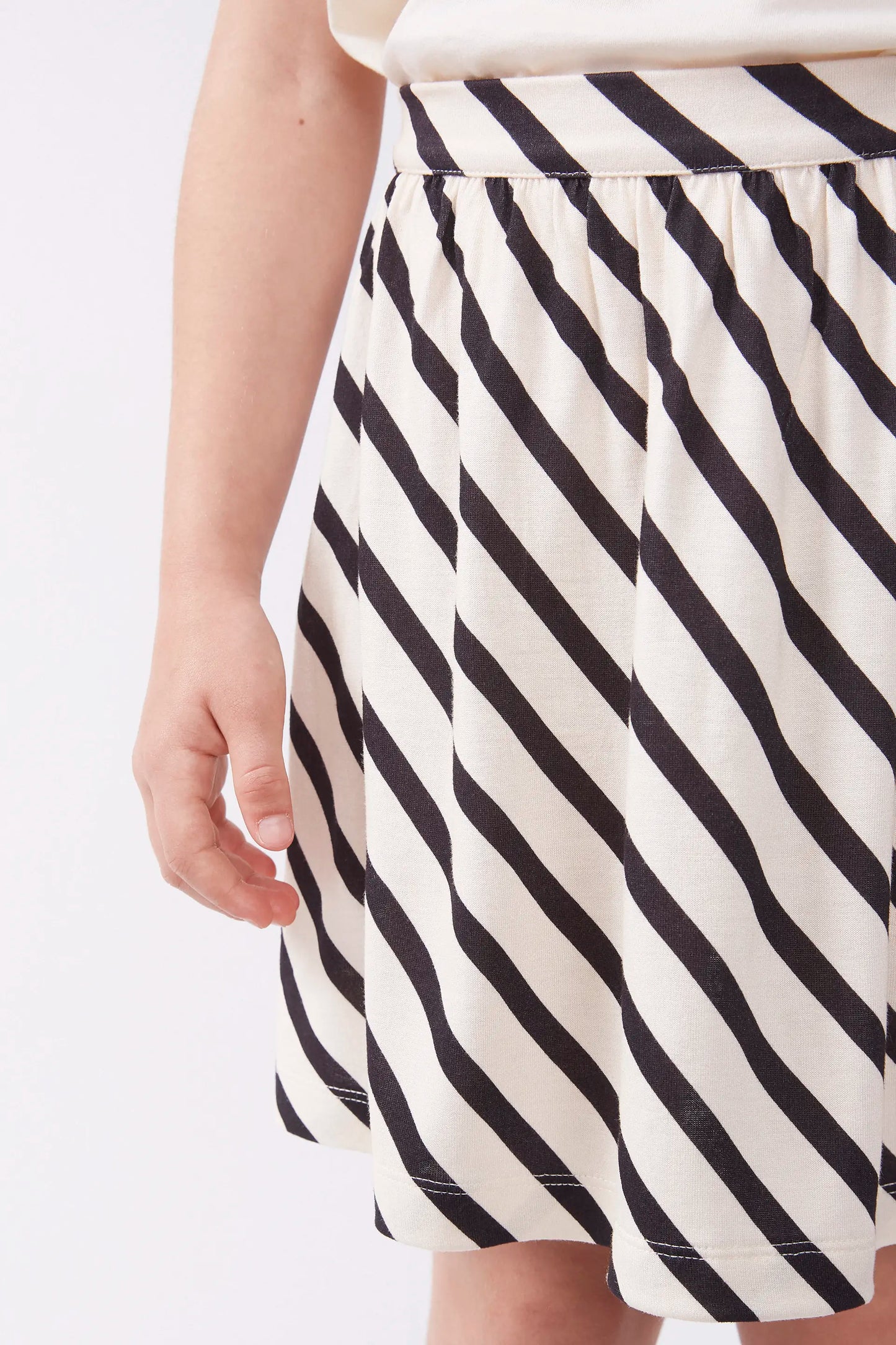 Short skirt for girls with piano stripes