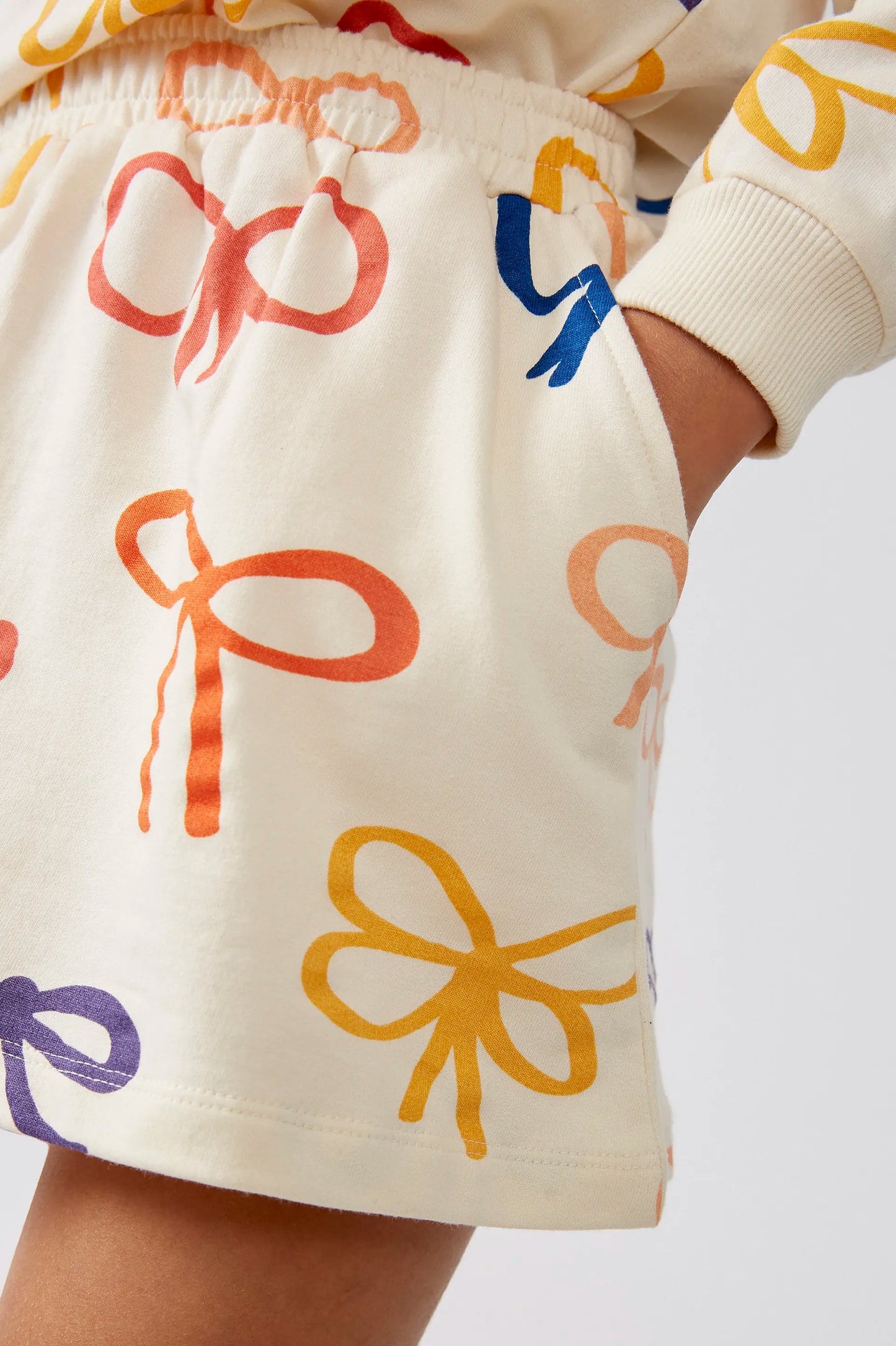 Falda corta de niña estampado de lazos