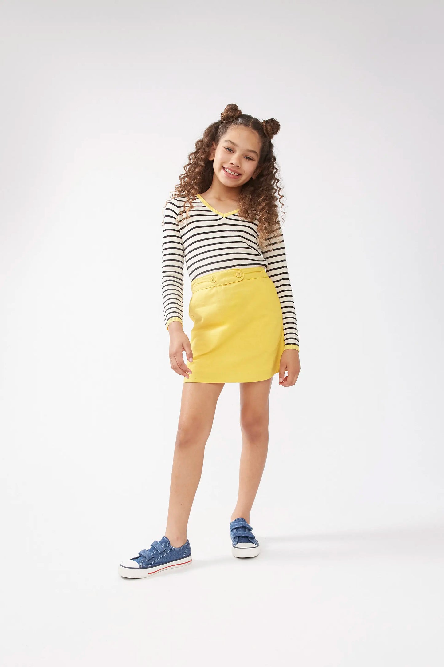 Yellow short skirt for girls with buttons