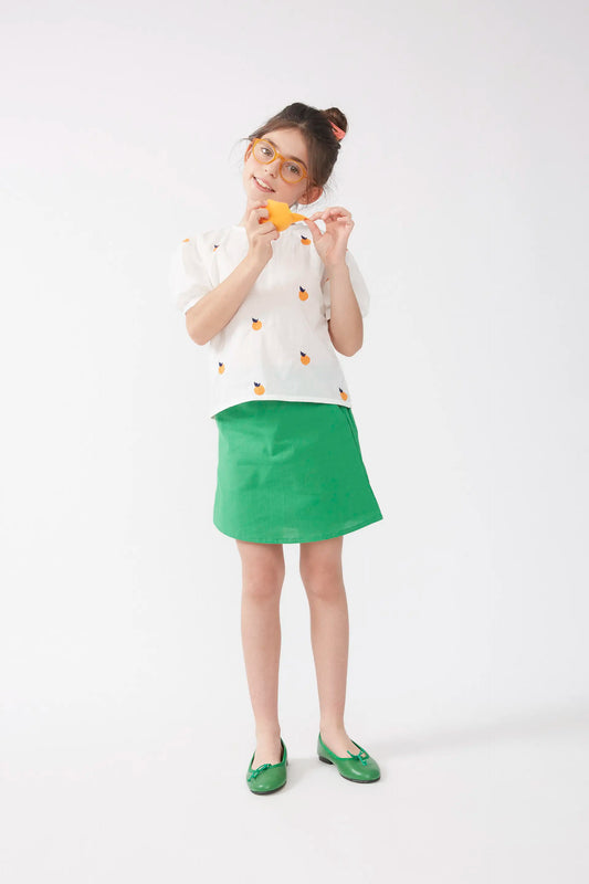 Camisa de niña con pomelos bordados