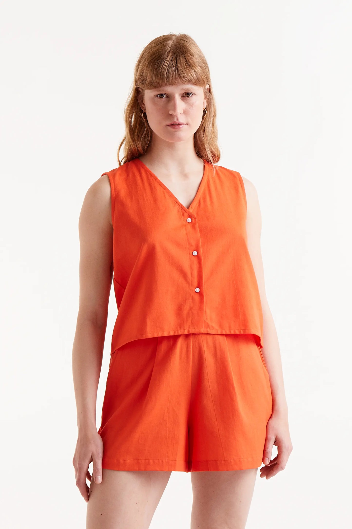 Orange button-down top