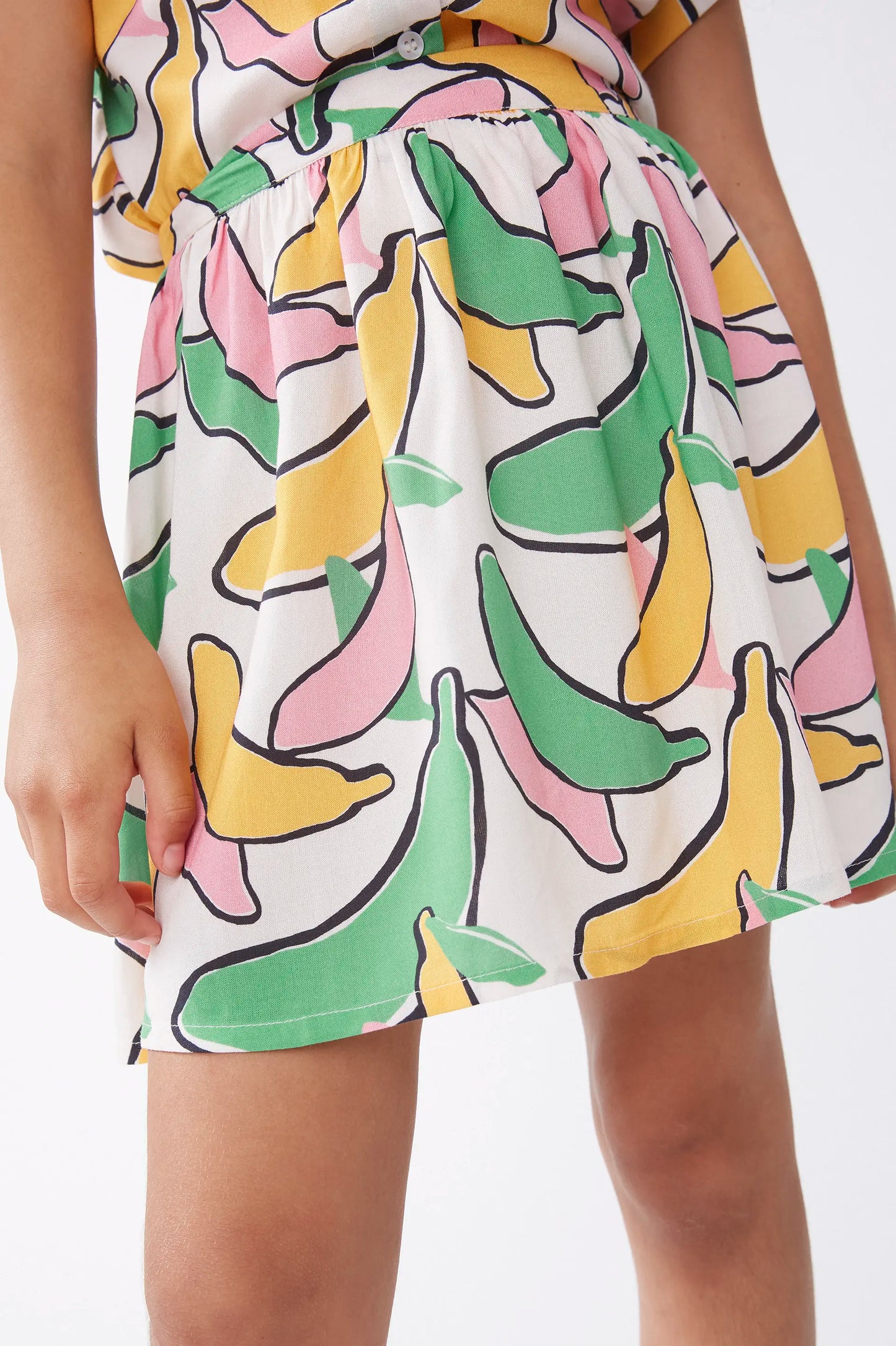 Falda corta de niña estampado Banana