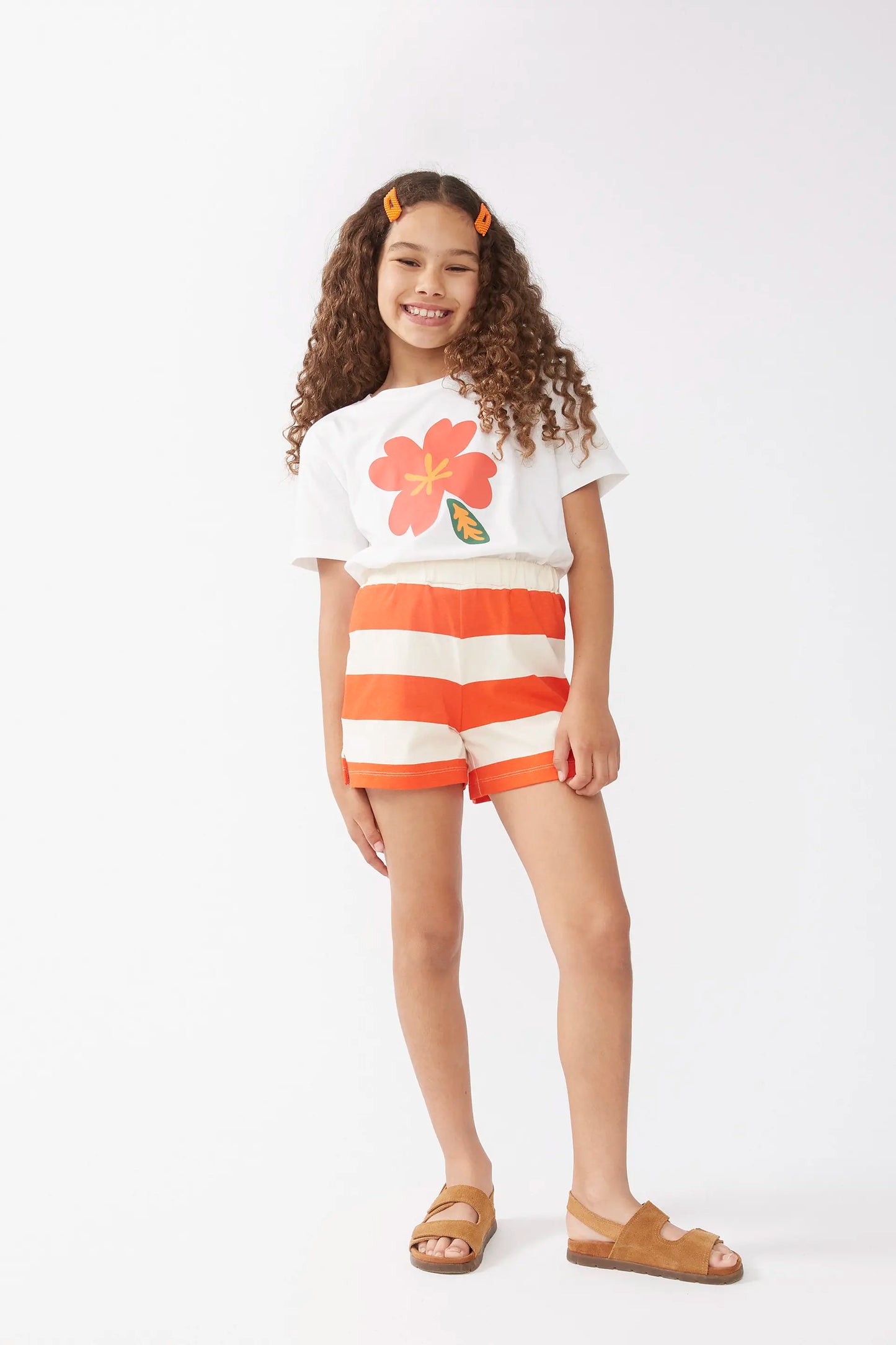 Pantaloncini a righe arancioni per bambine