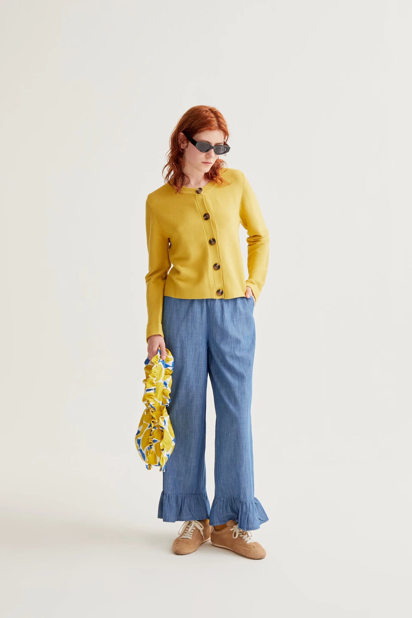 Yellow knit cardigan with large buttons