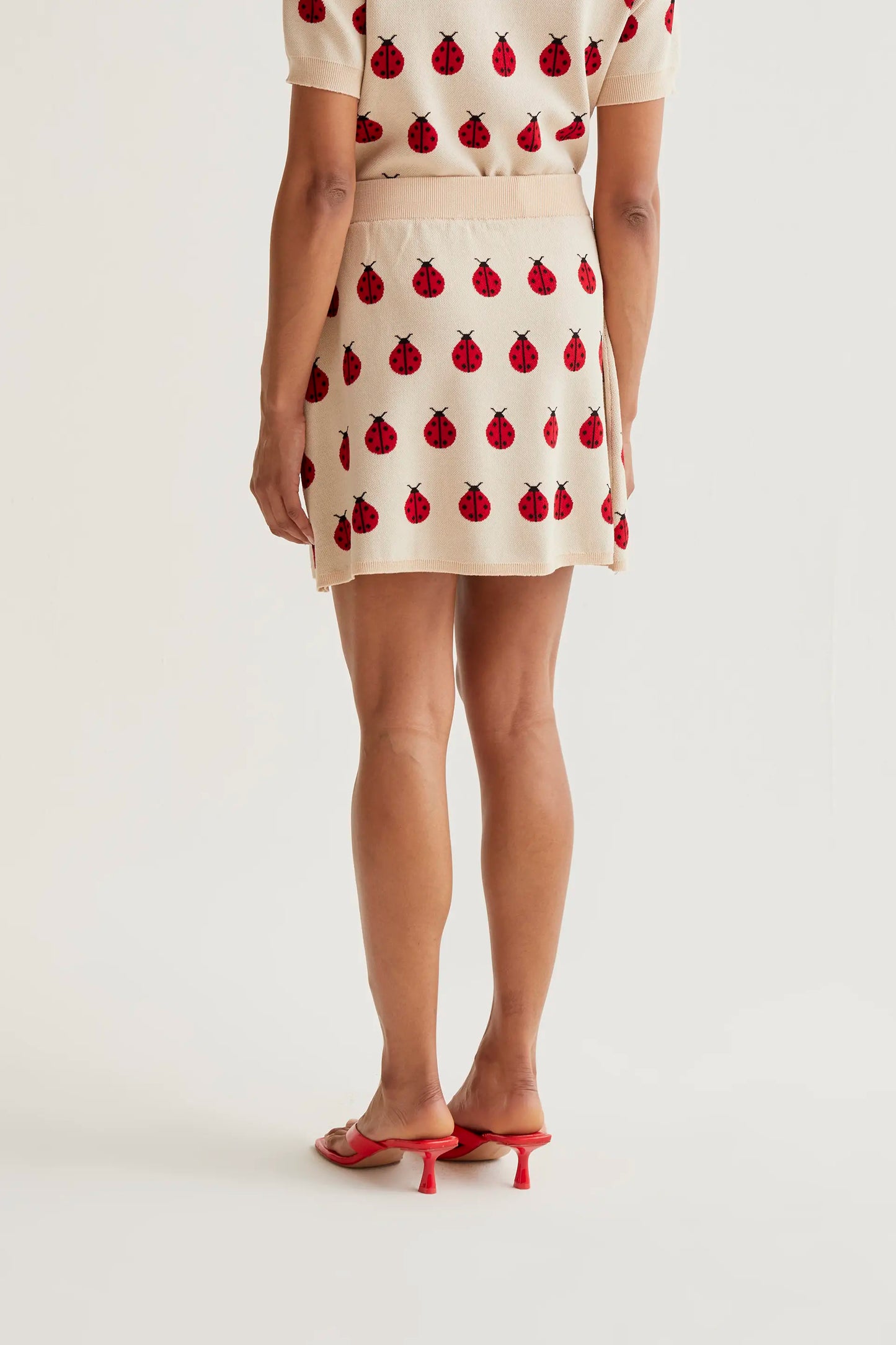 Short skirt with Red Coccinella print