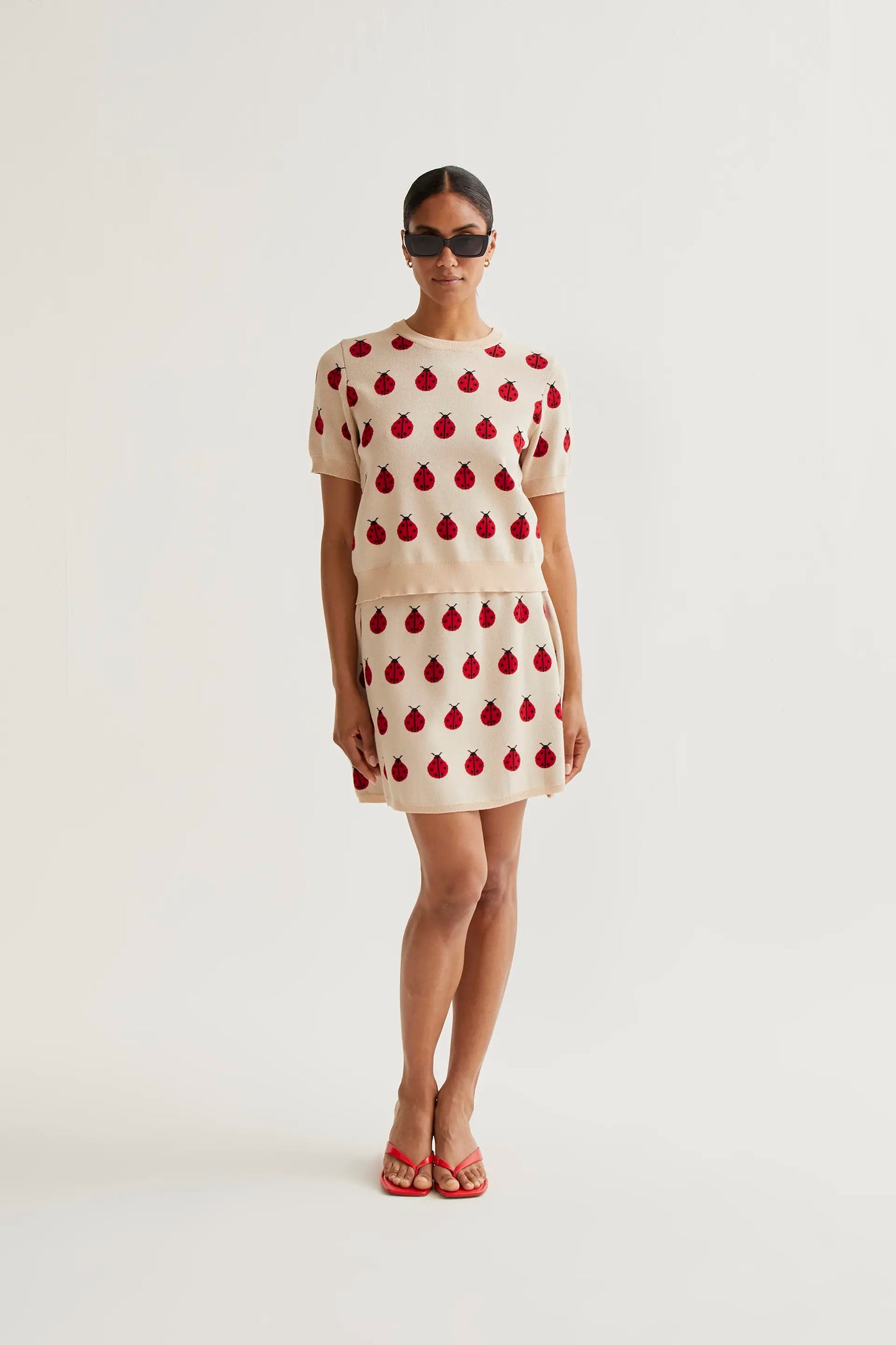 Short skirt with Red Coccinella print