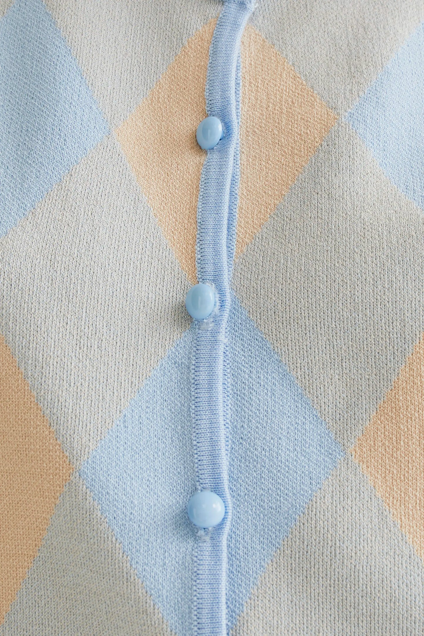 Top de punto con rombos azul