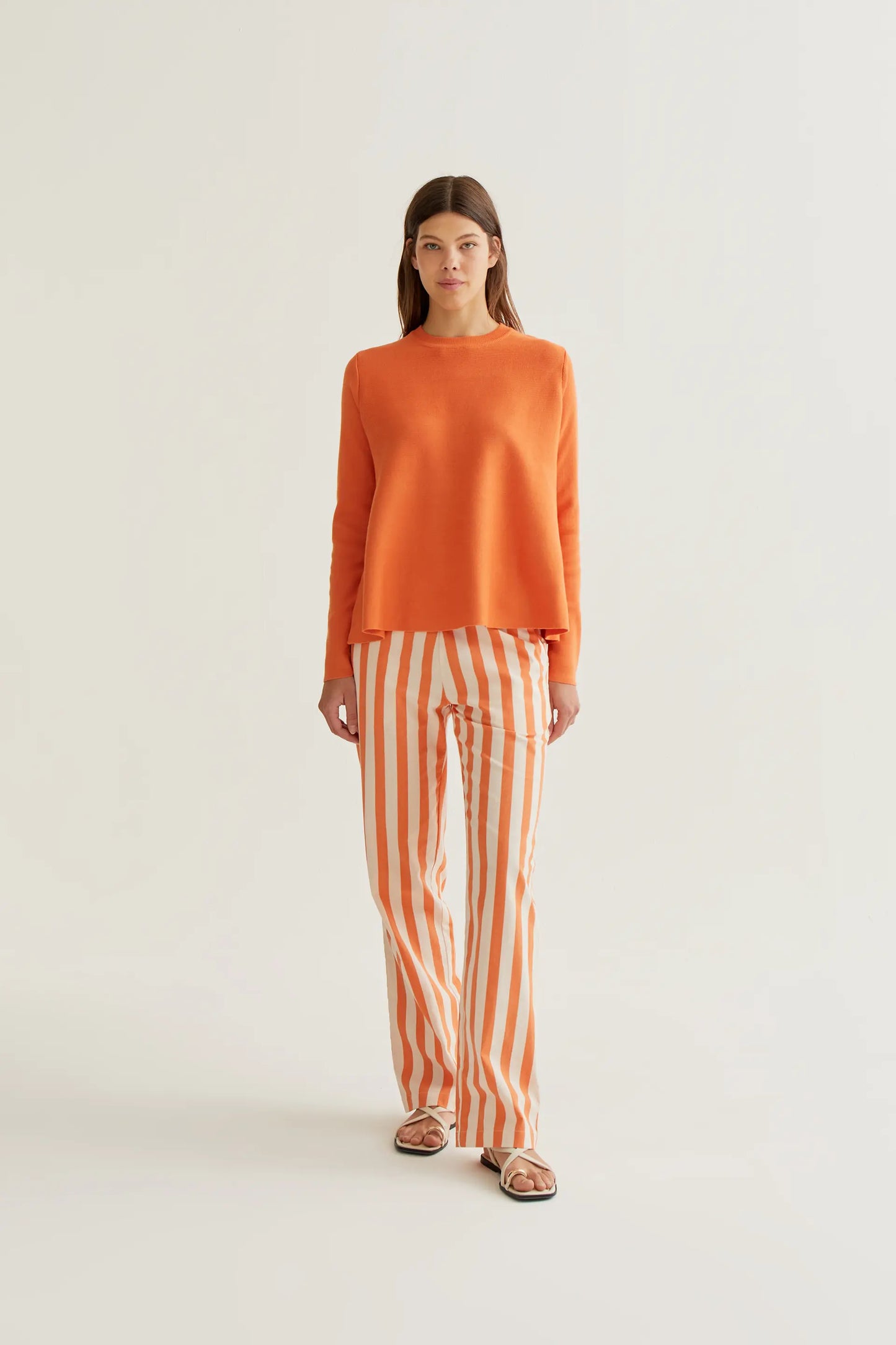Orange long-sleeved knit sweater