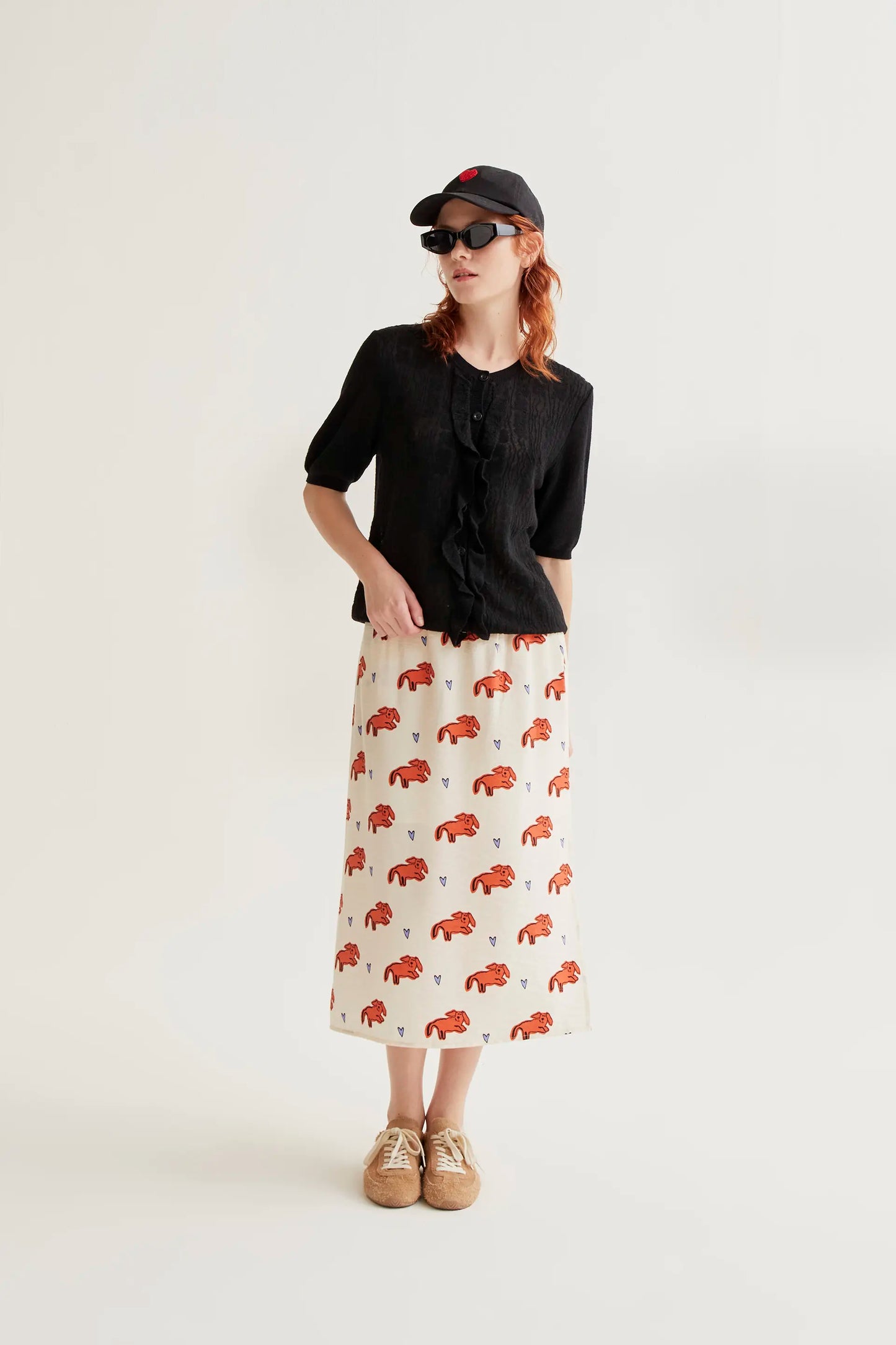 Cardigan in maglia floreale nera con volant