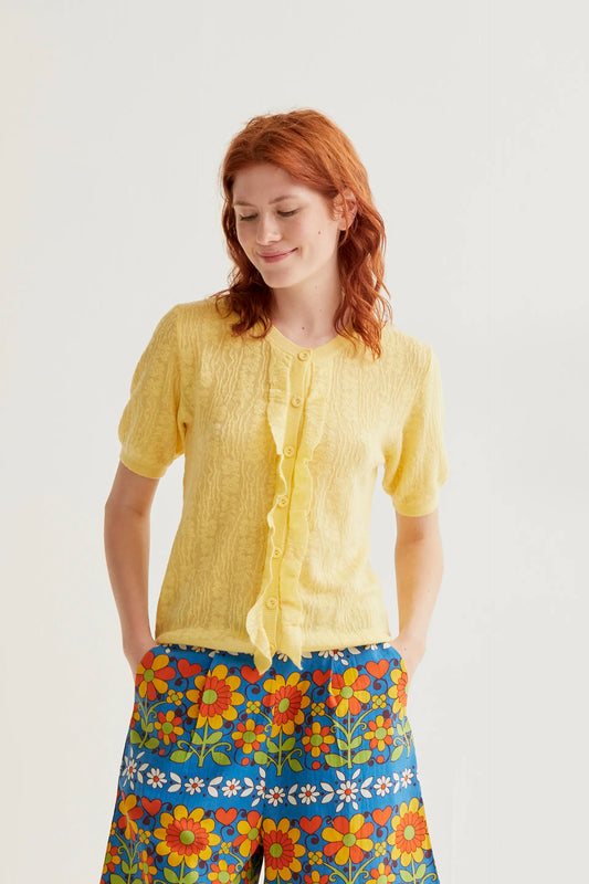 Cárdigan punto floral amarillo con volantes