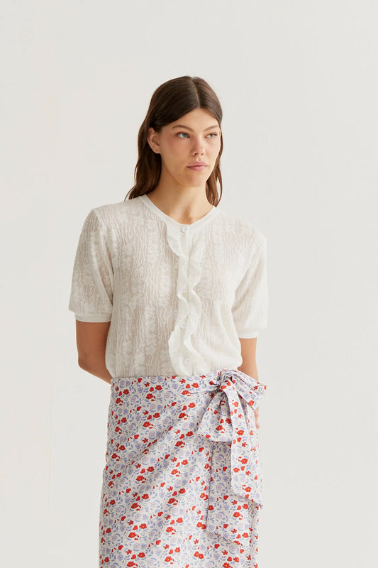 Cárdigan punto floral blanco con volantes