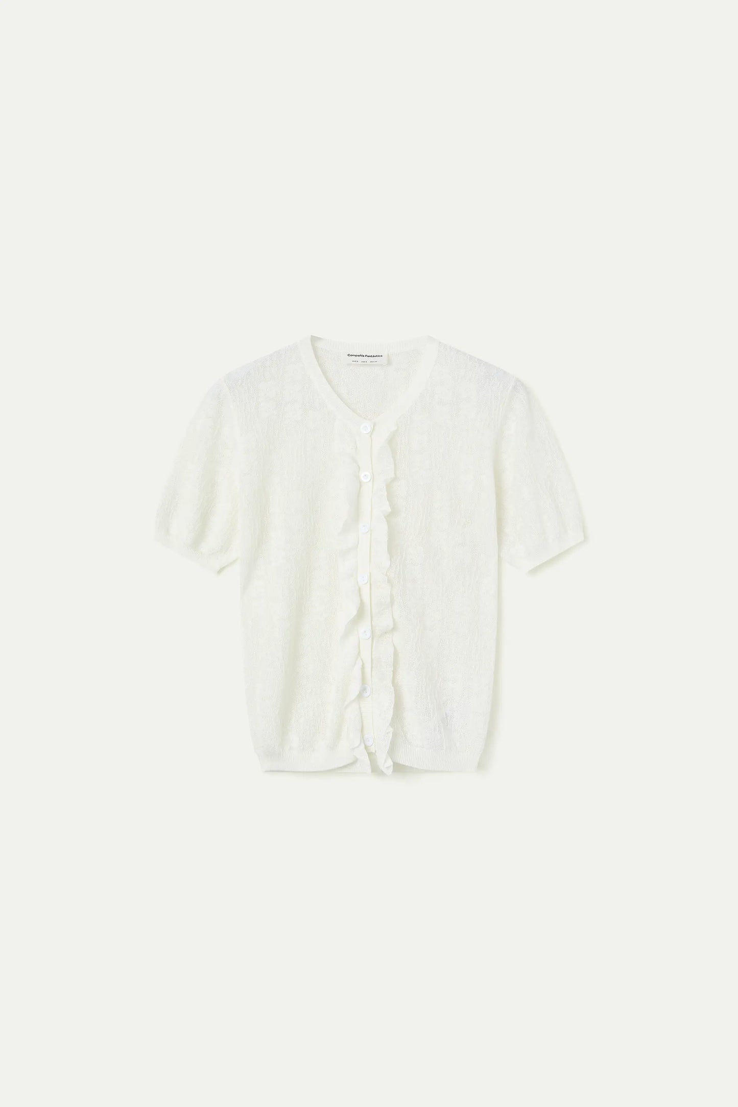 Cárdigan punto floral blanco con volantes