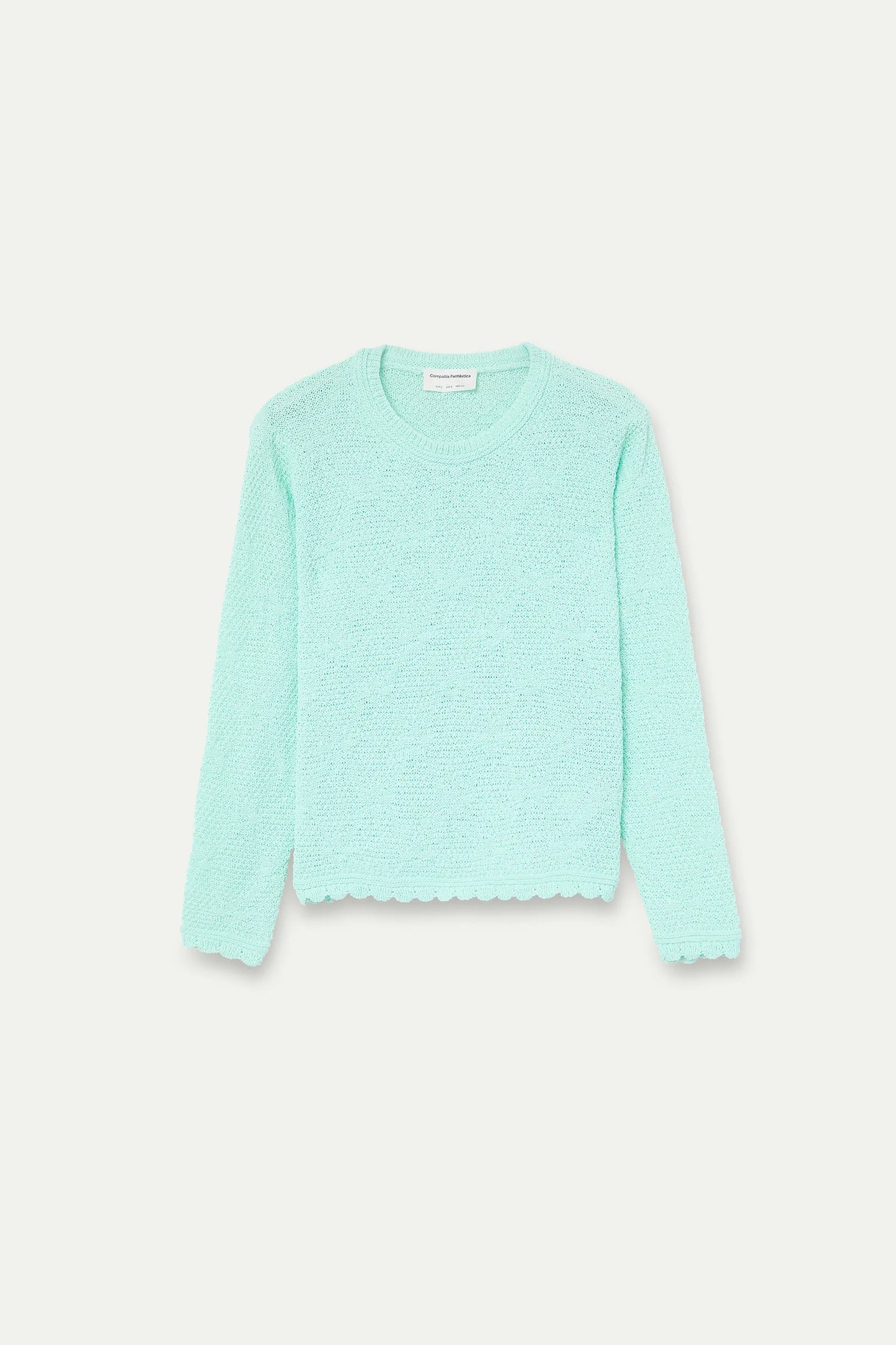 Maglietta in maglia a trama verde chiaro