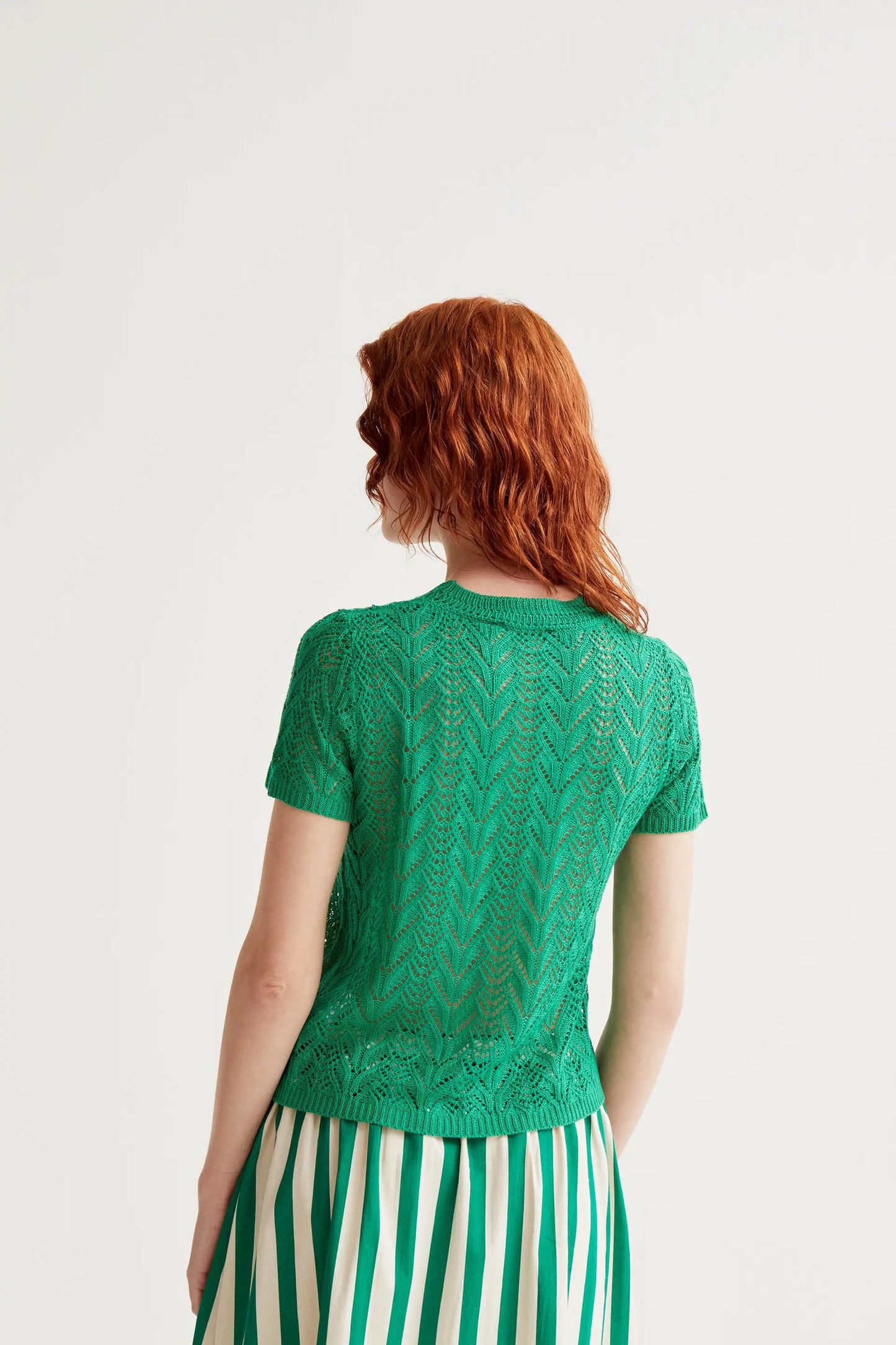 Top traforato ricamato a forma di fiore verde
