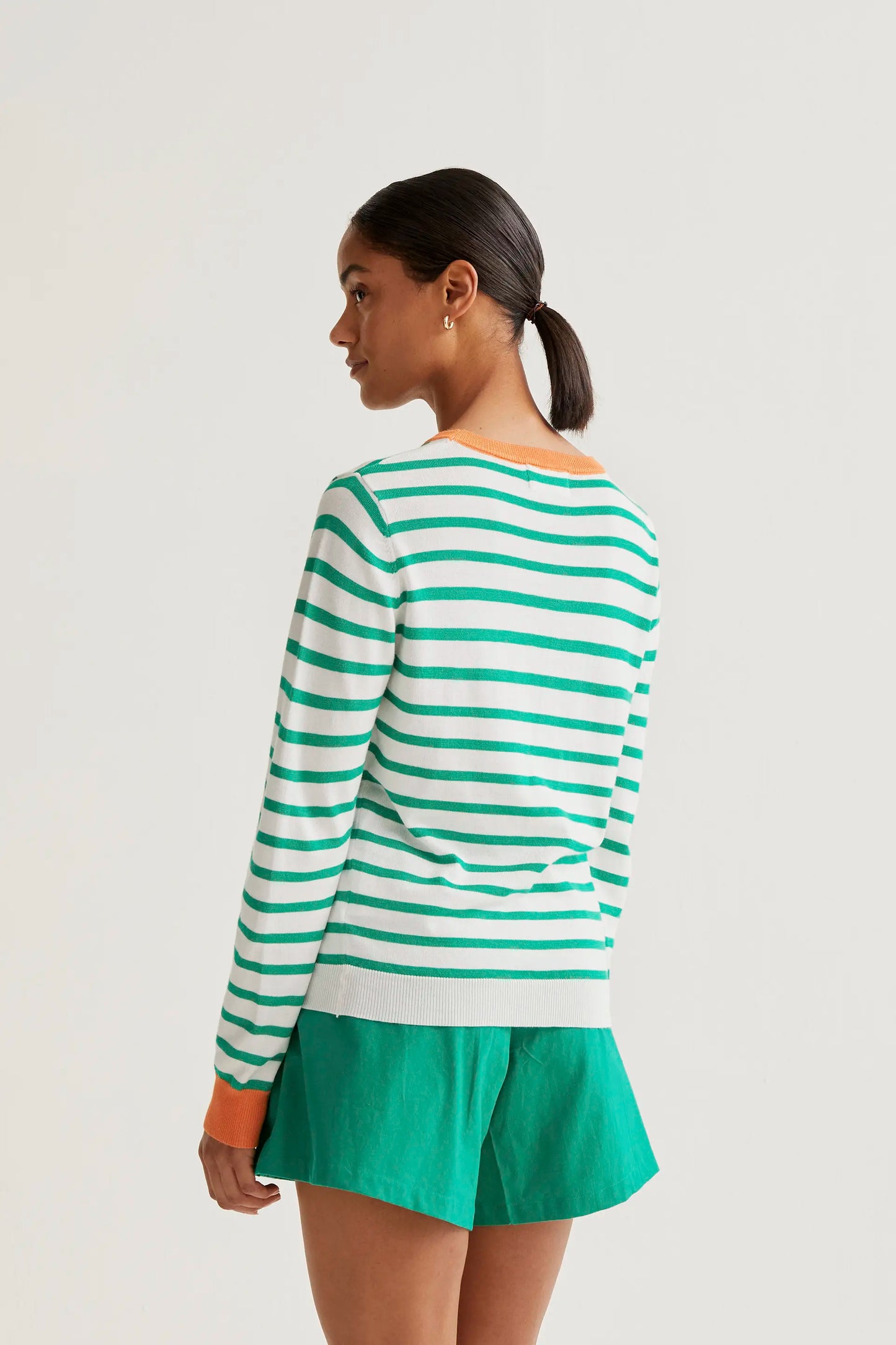 Knitted sweater with white and green striped print