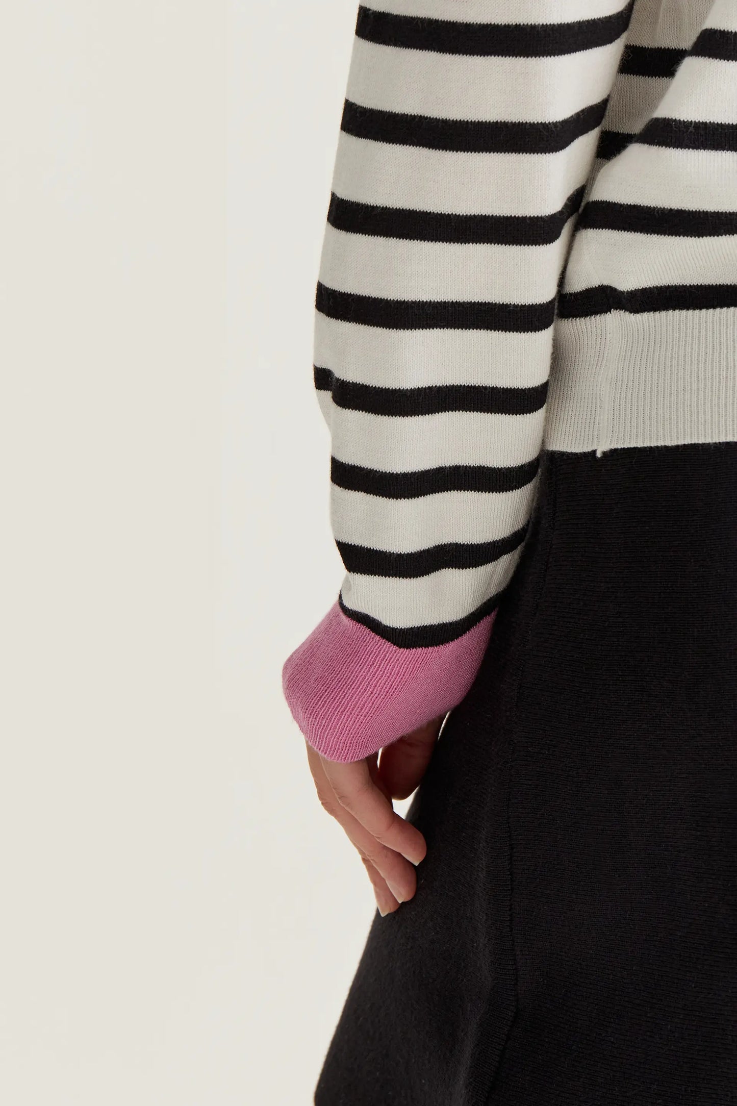 Knitted sweater with black and white striped print