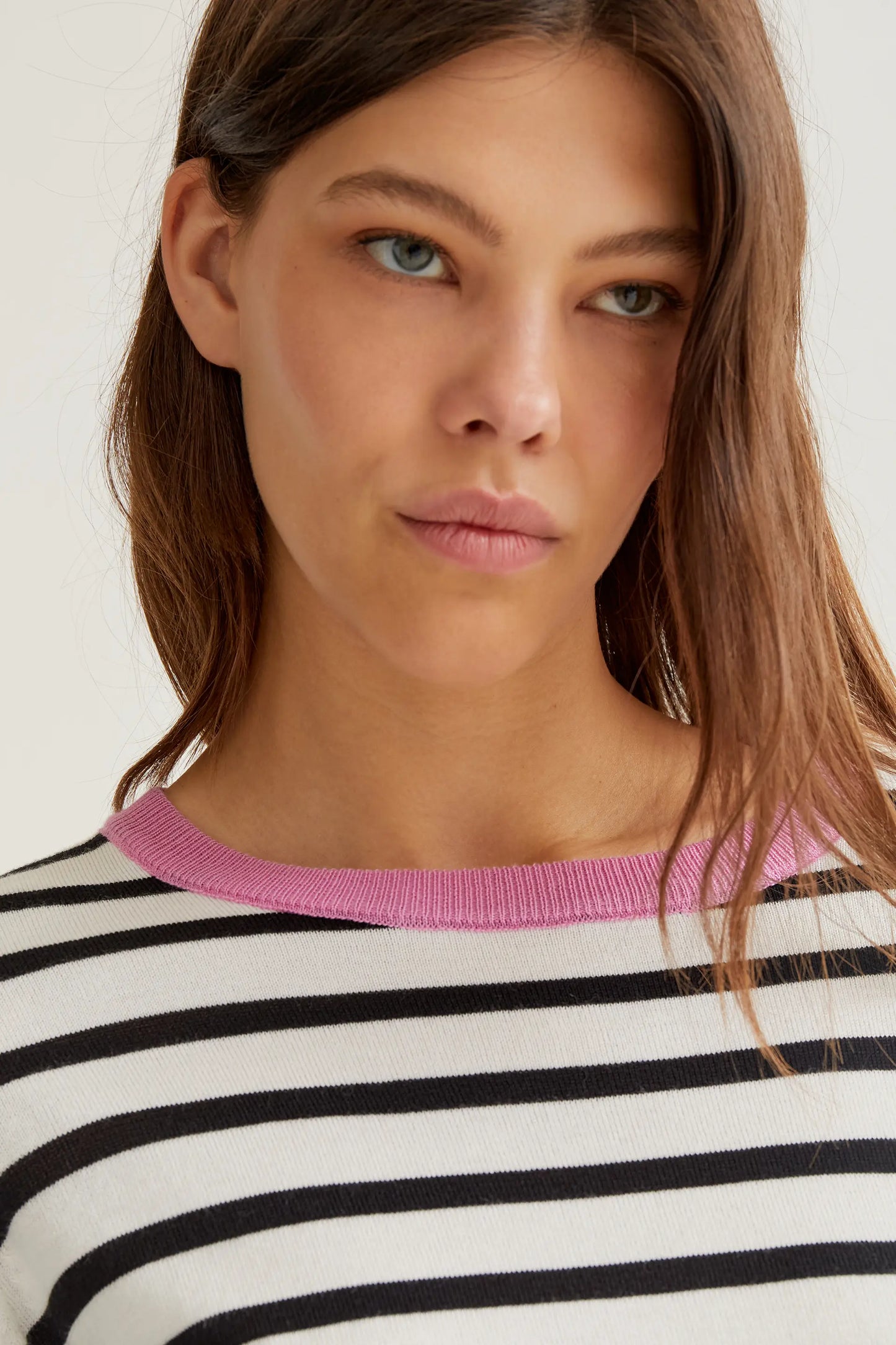 Knitted sweater with black and white striped print