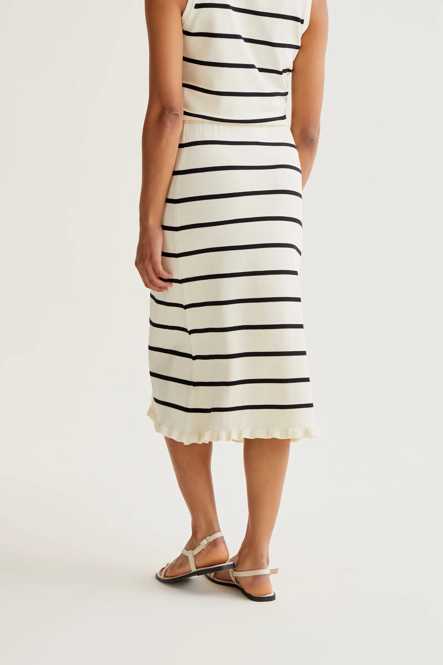 Black and white striped knit midi skirt