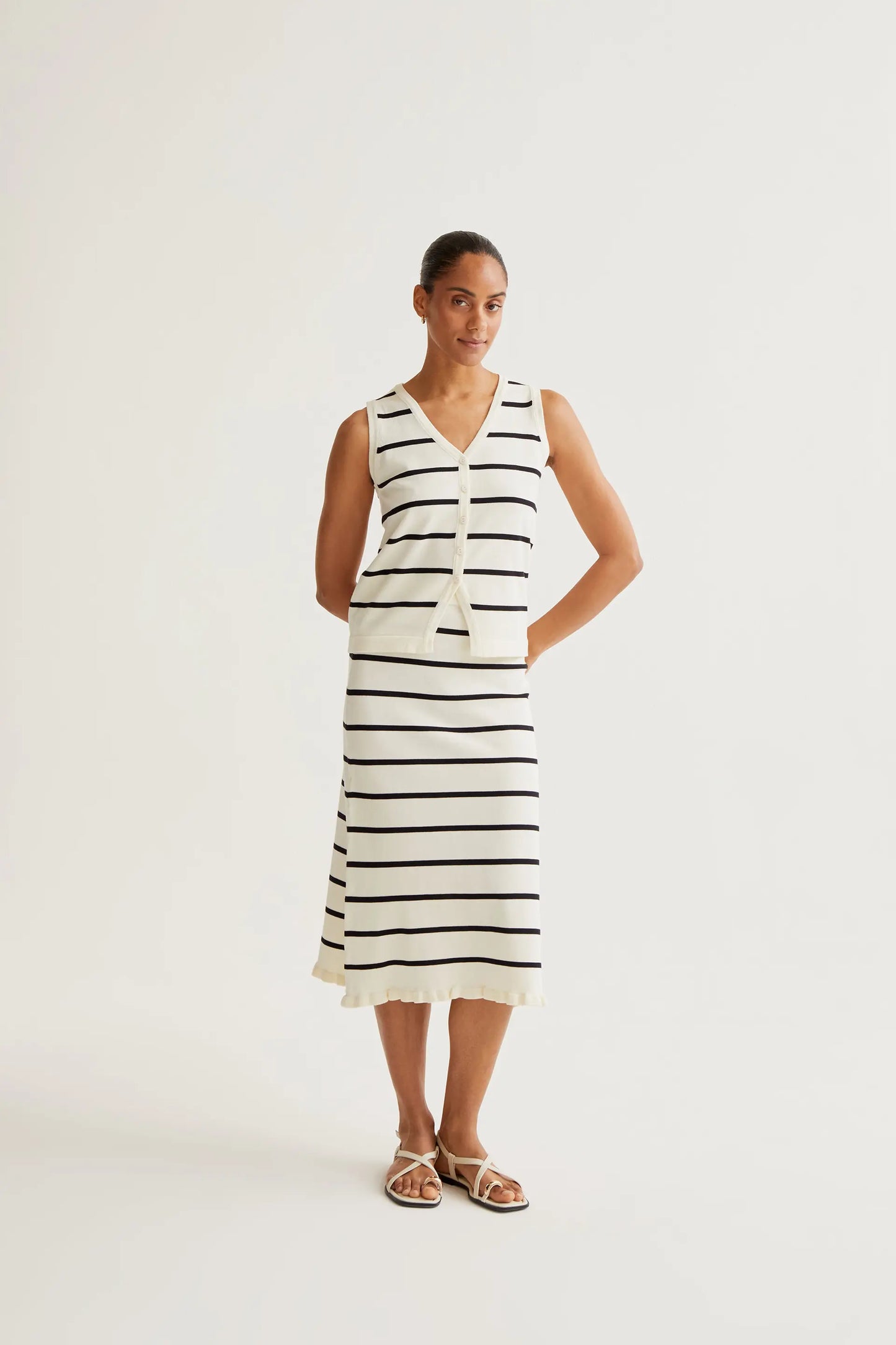 Black and white striped knit midi skirt