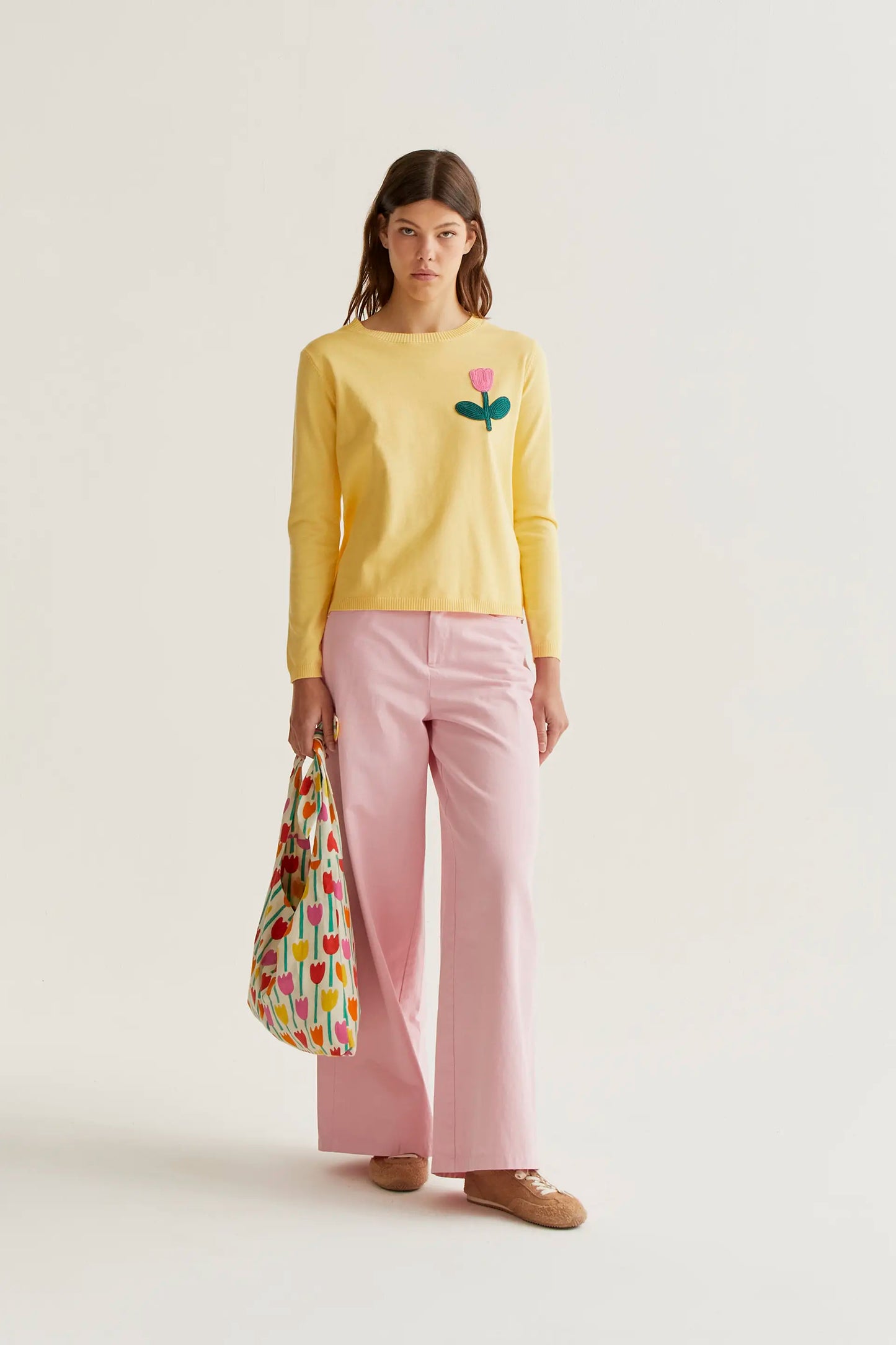 Yellow knit sweater with pink tulip embroidery