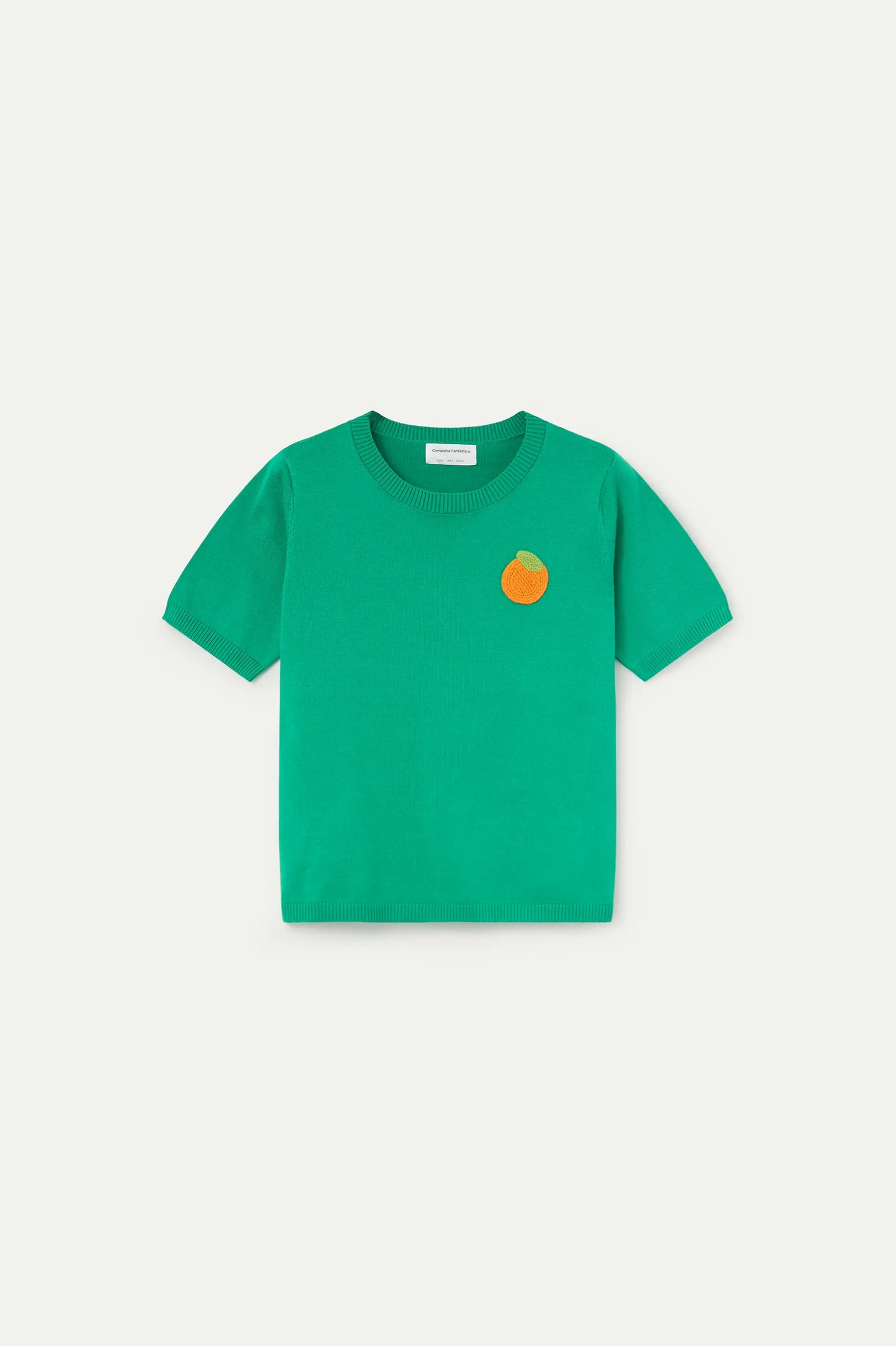 Green knit top with orange embroidery