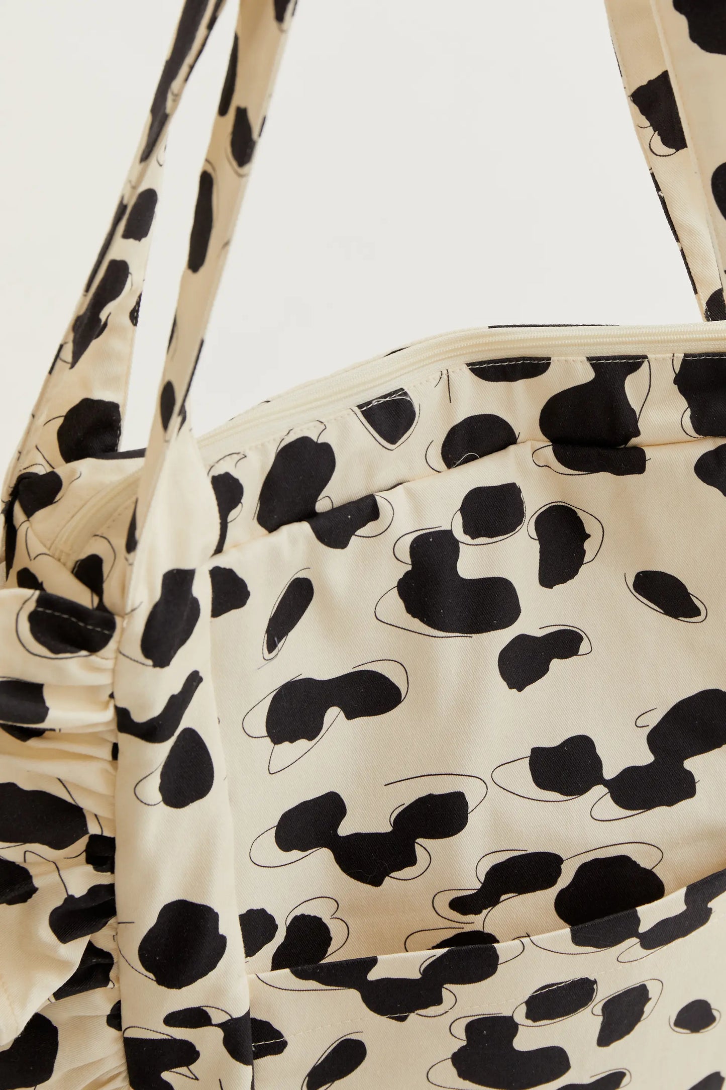 Bolso acolchado con estampado Dalmatian