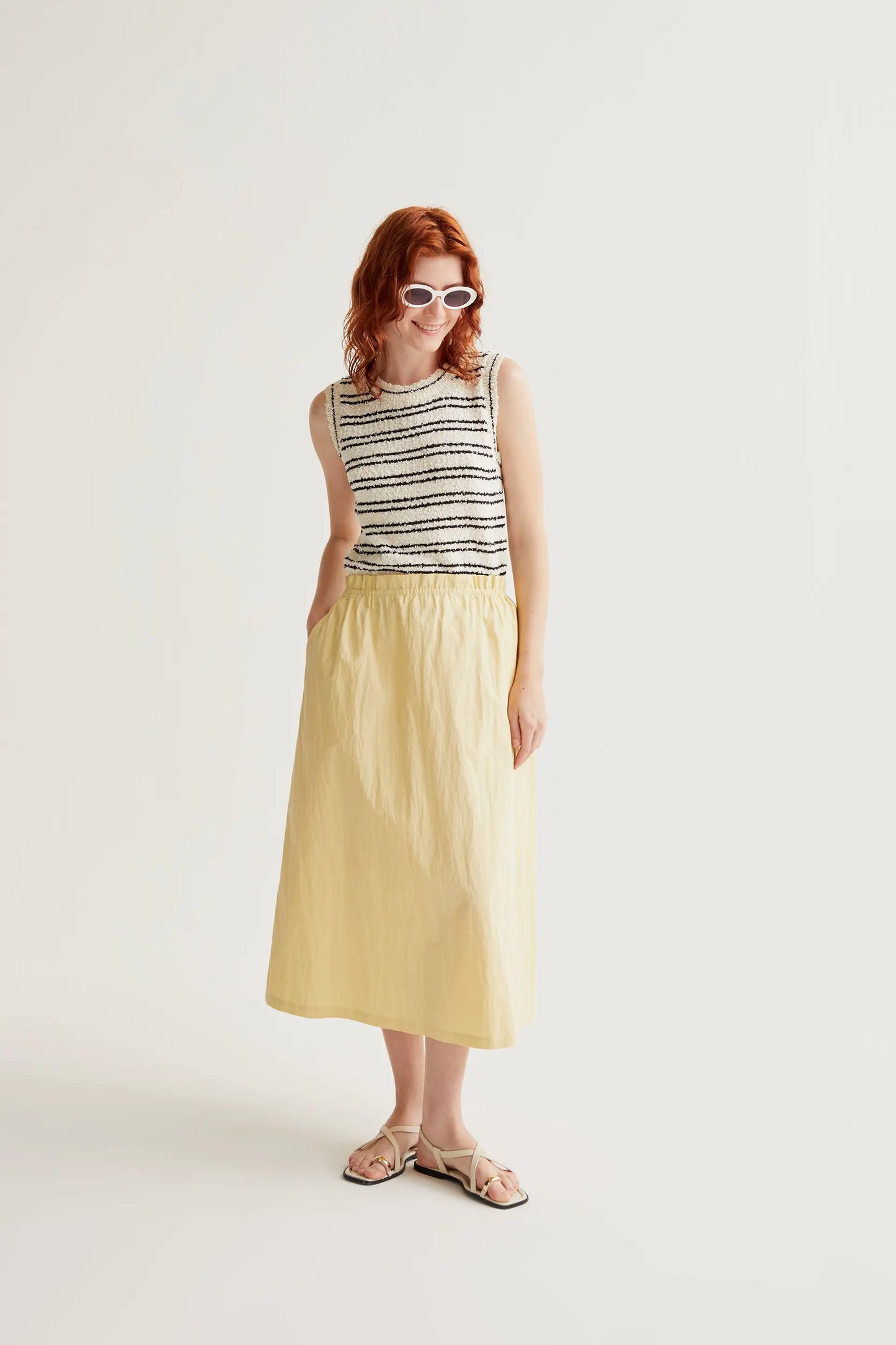 Falda midi amarillo claro