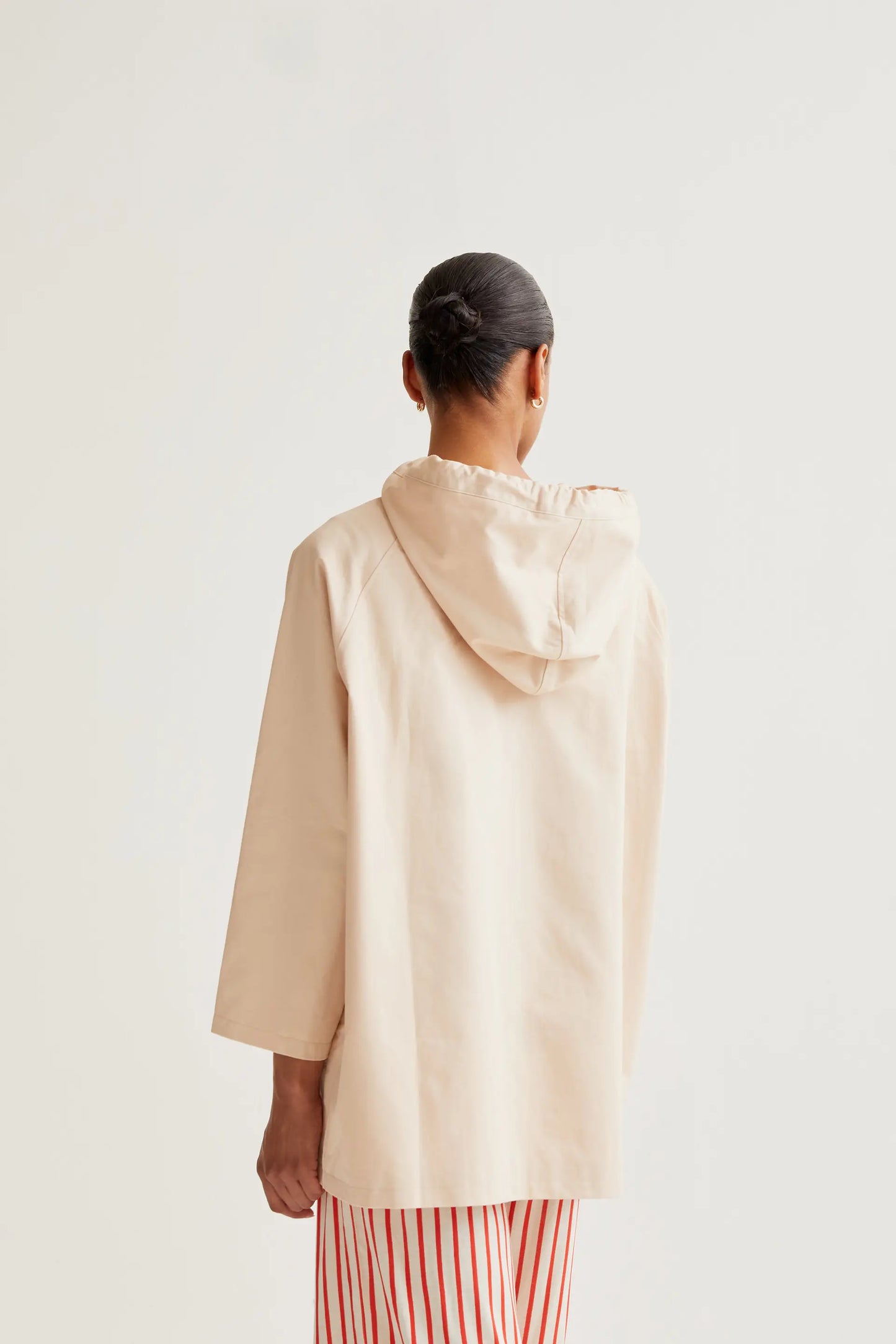 Trench coat with ladybug print