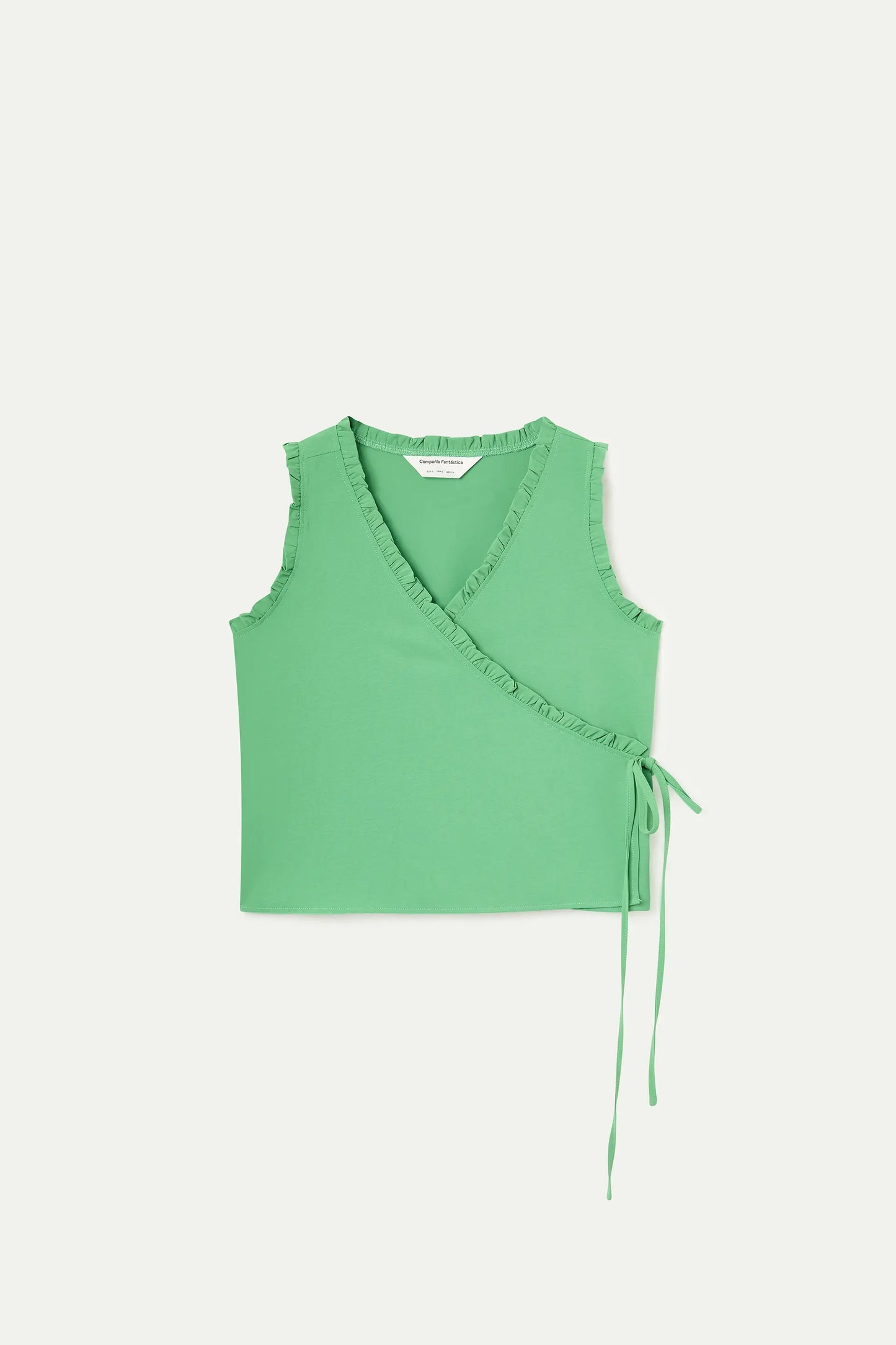 Green top with a V-neck