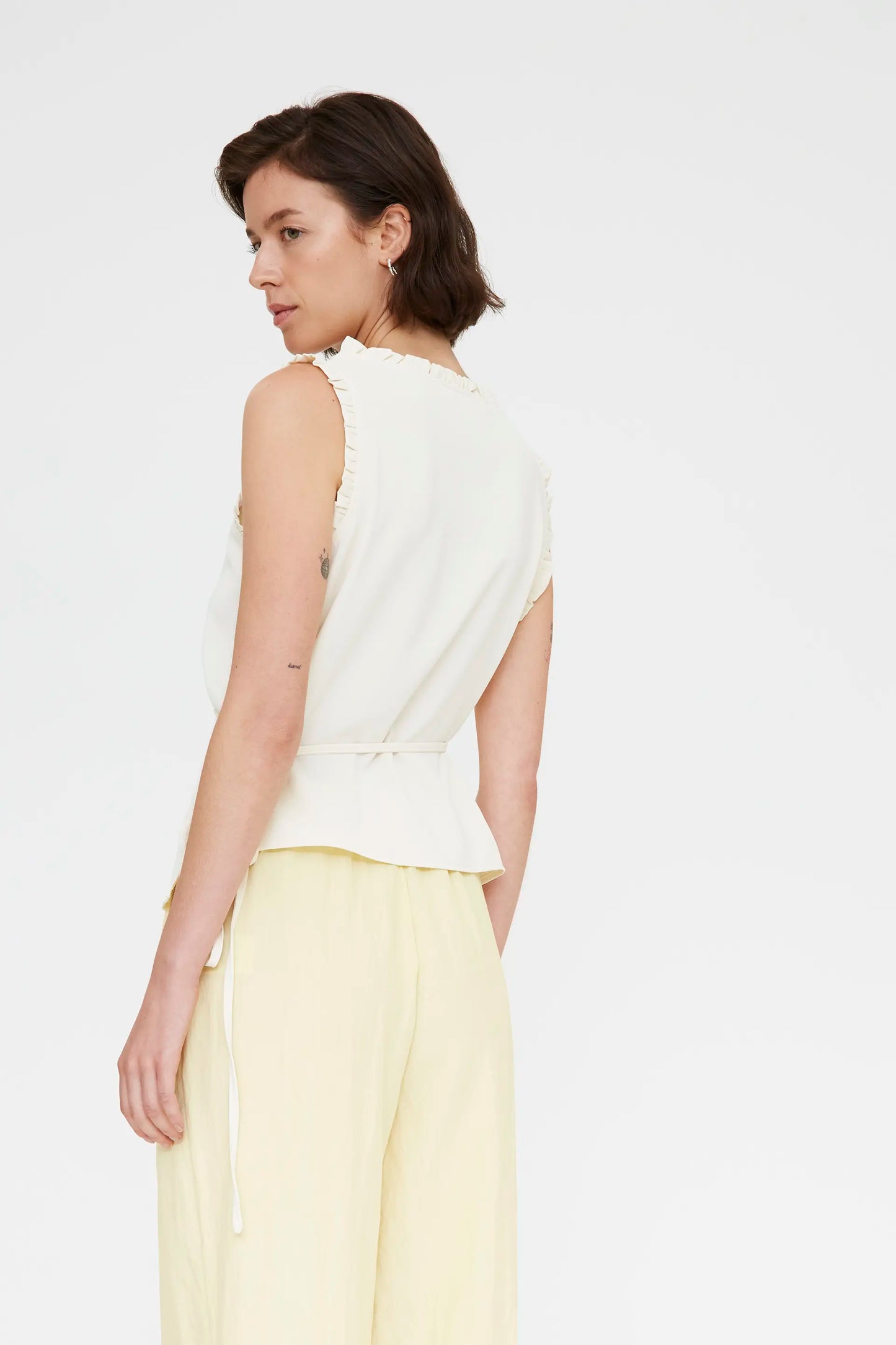 Off-white top with a V-neck