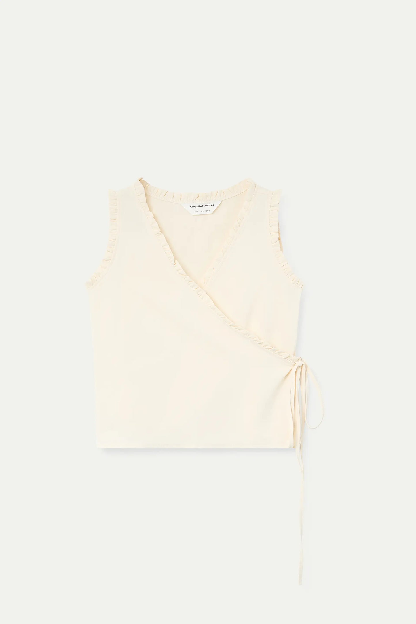 Off-white top with a V-neck