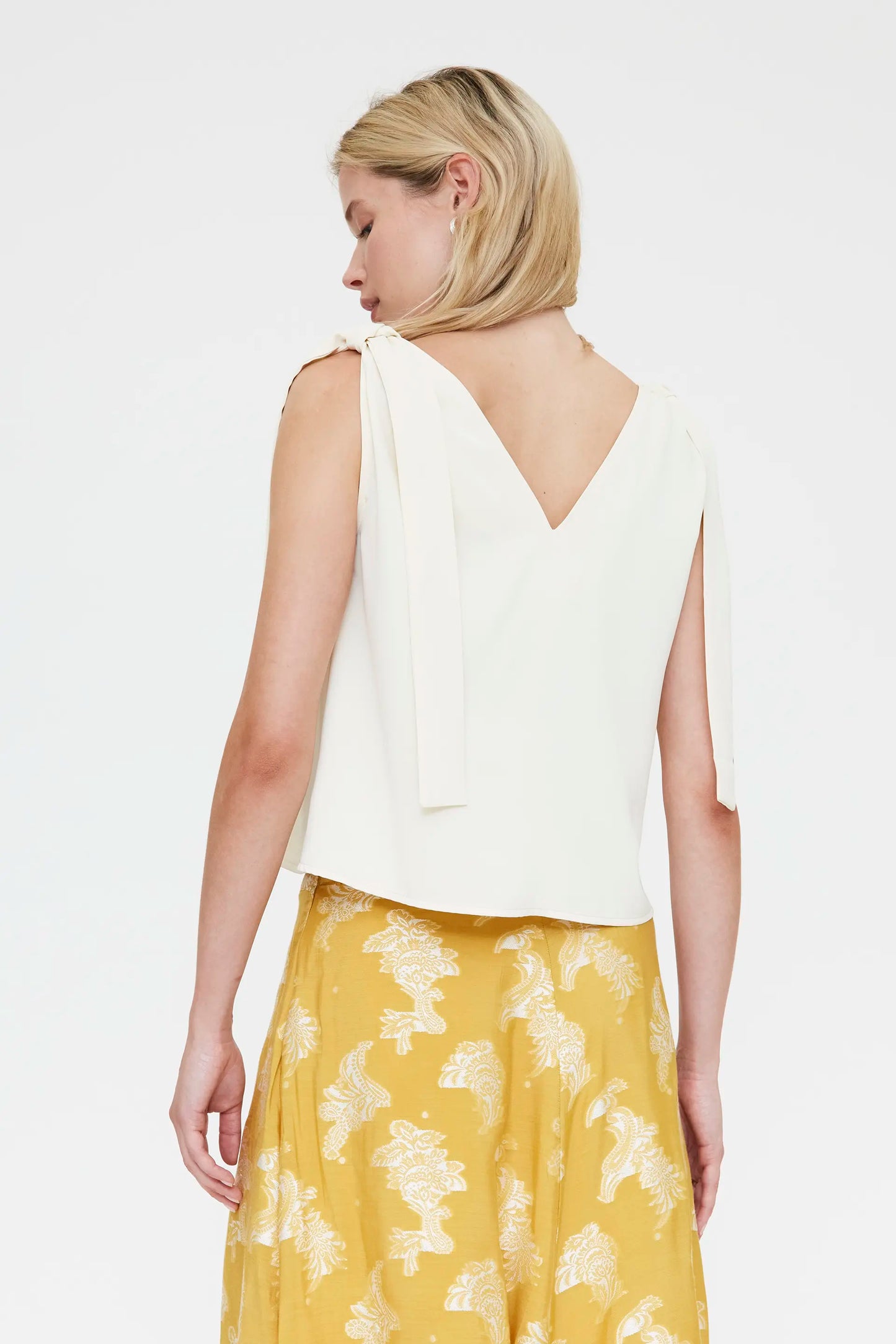Off-white top with tie straps