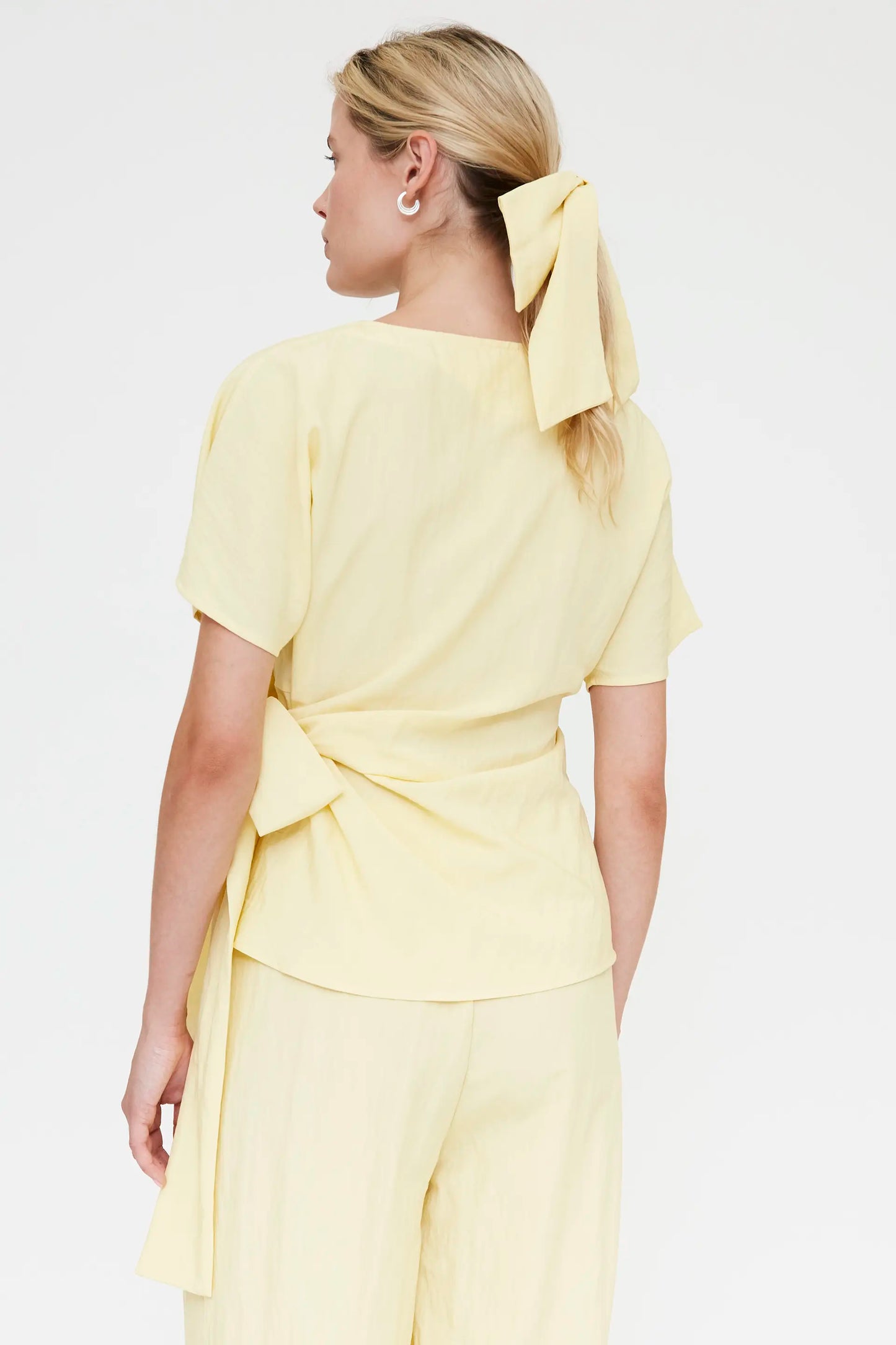 Light yellow top with tie detail