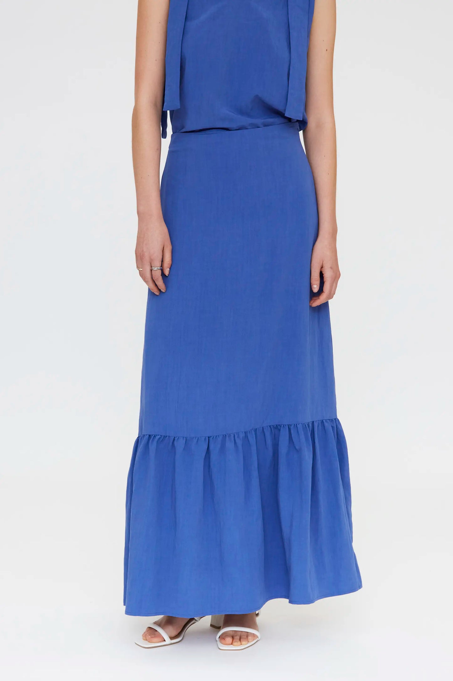 Long blue skirt with ruffles