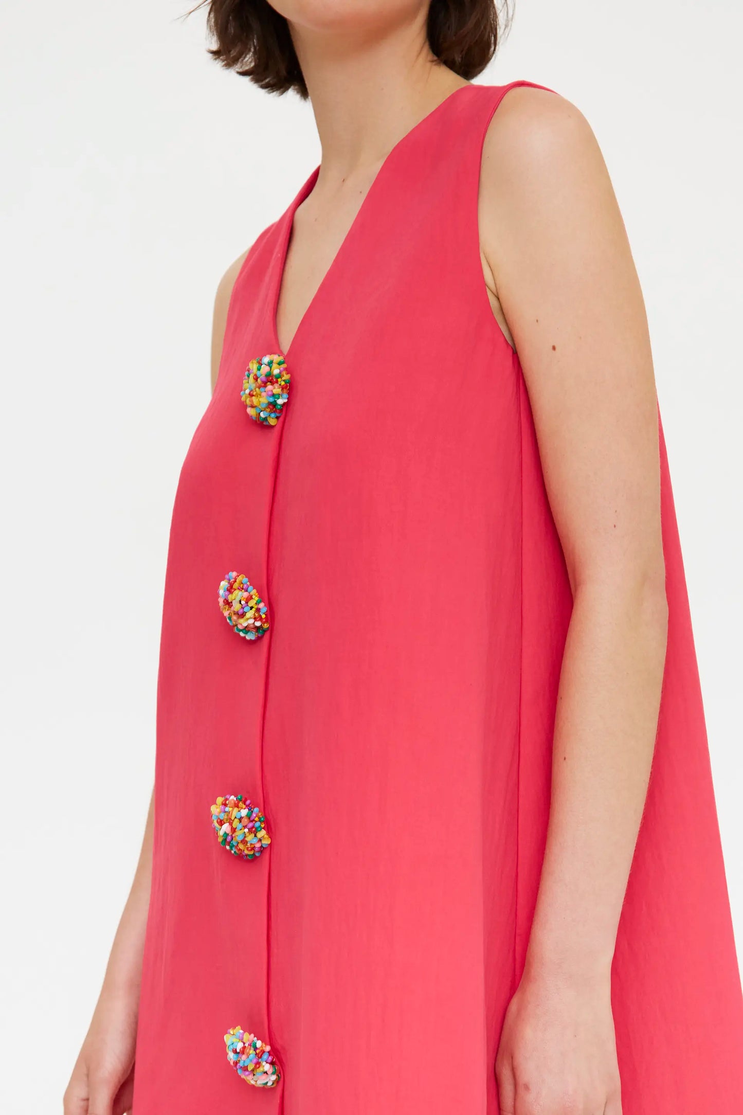 Vestido corto fucsia con botones multicolor