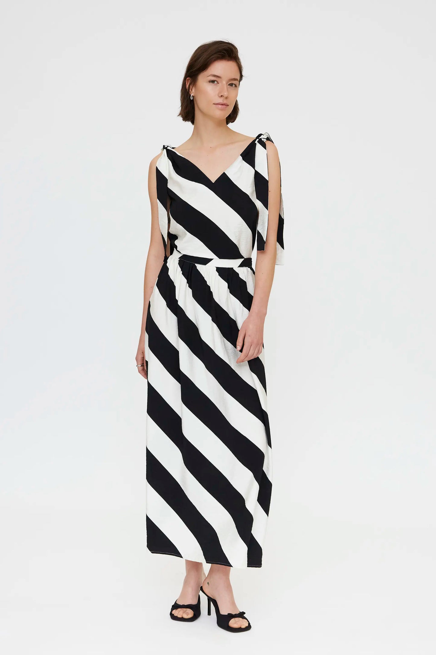 Top with diagonal striped print in black and white