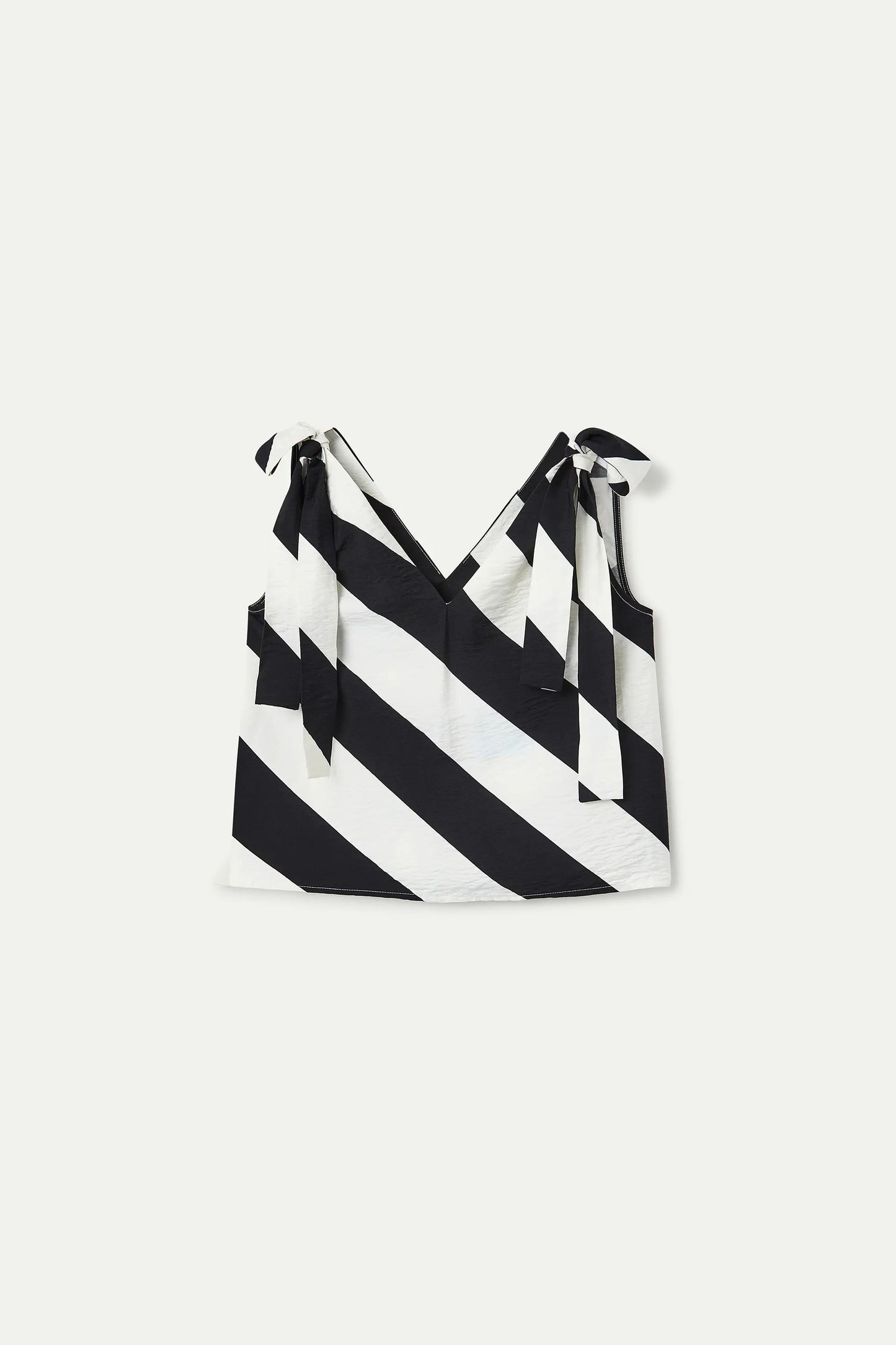 Top with diagonal striped print in black and white