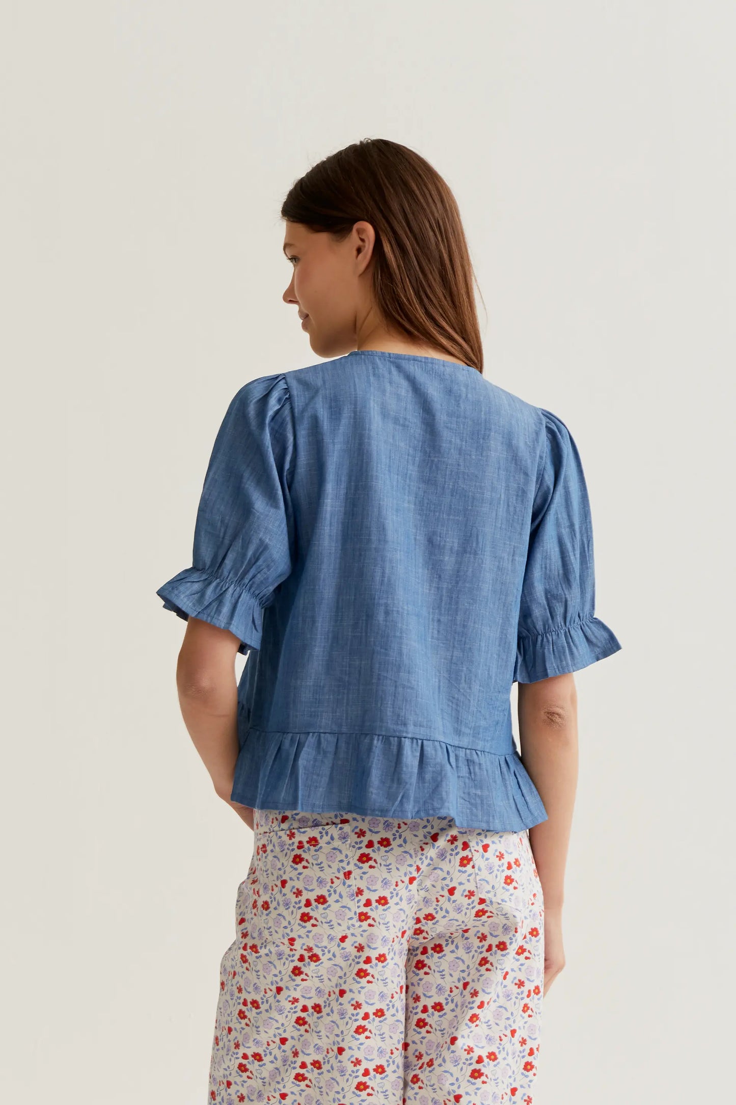 Light blue chambray 100% cotton shirt.