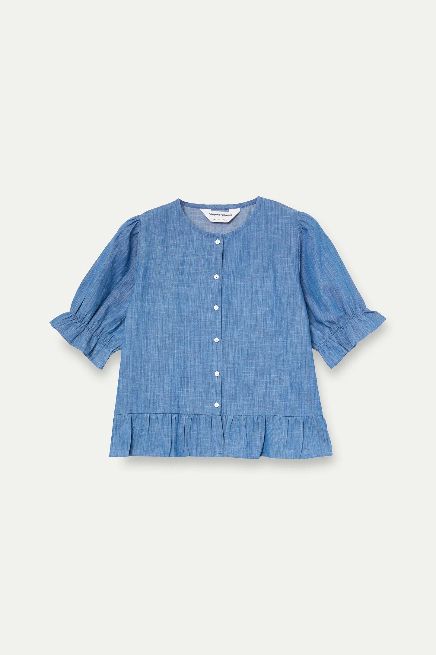 Light blue chambray 100% cotton shirt.
