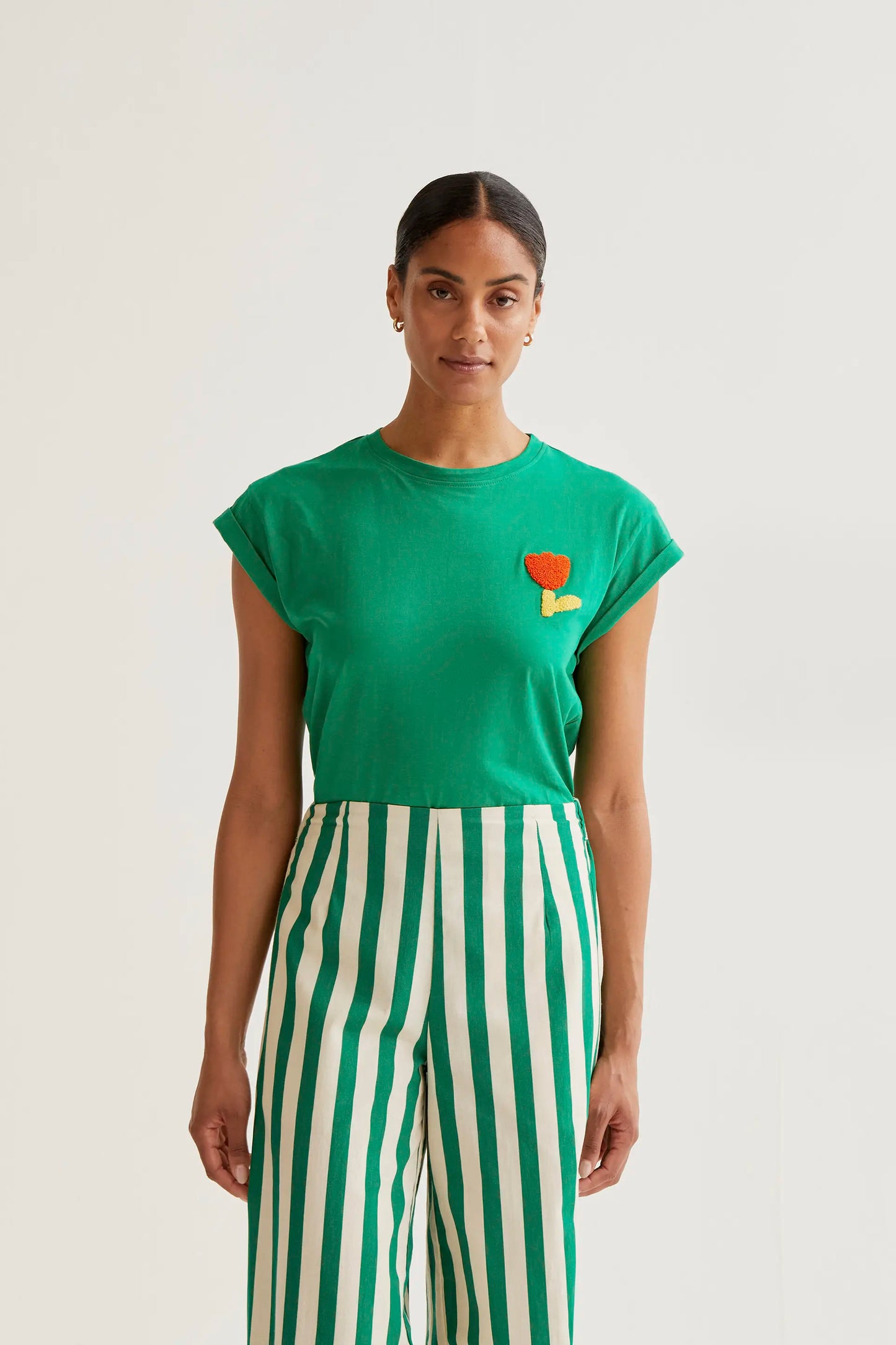 Green t-shirt with red tulip embroidery