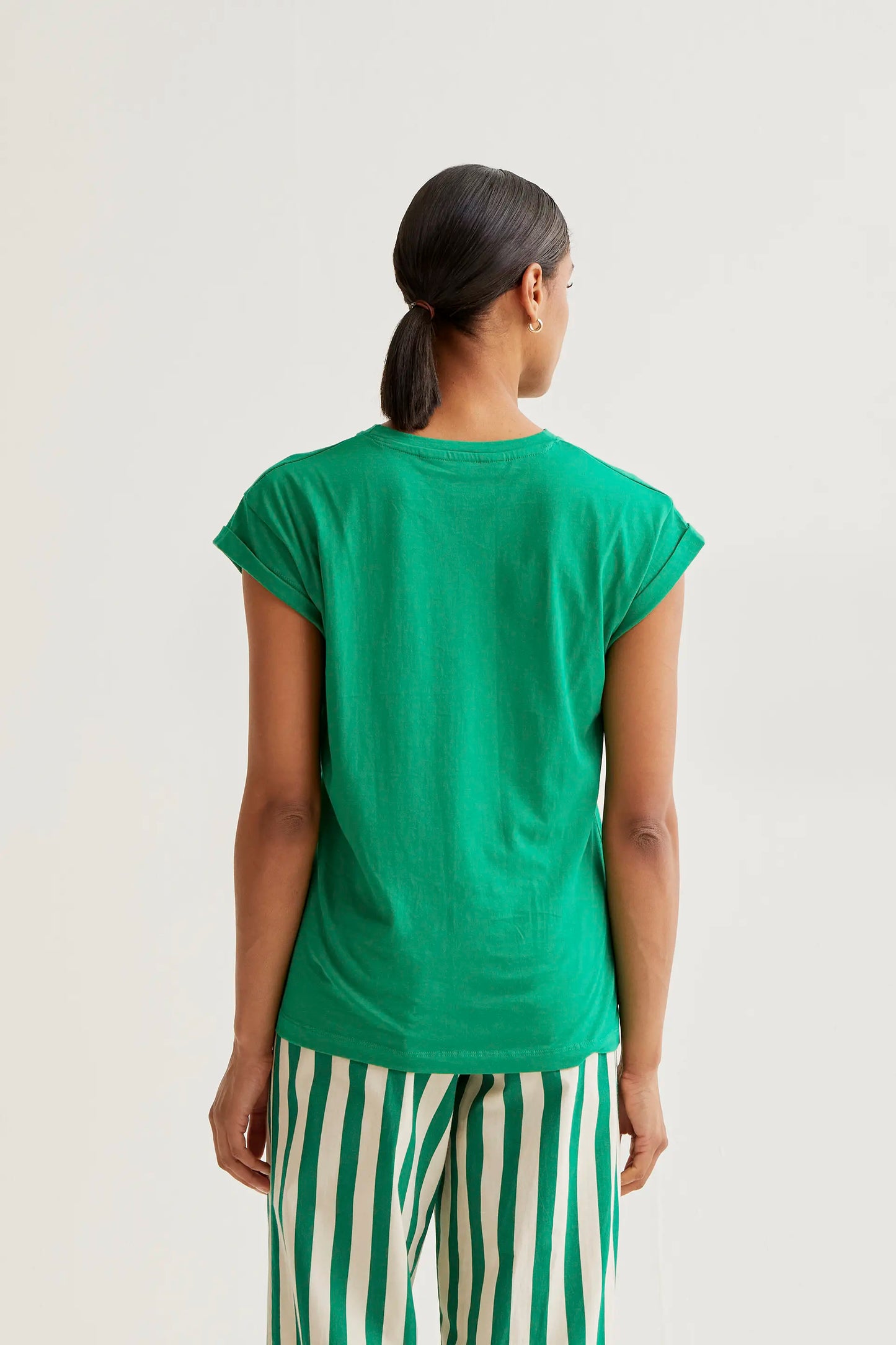 Green t-shirt with red tulip embroidery