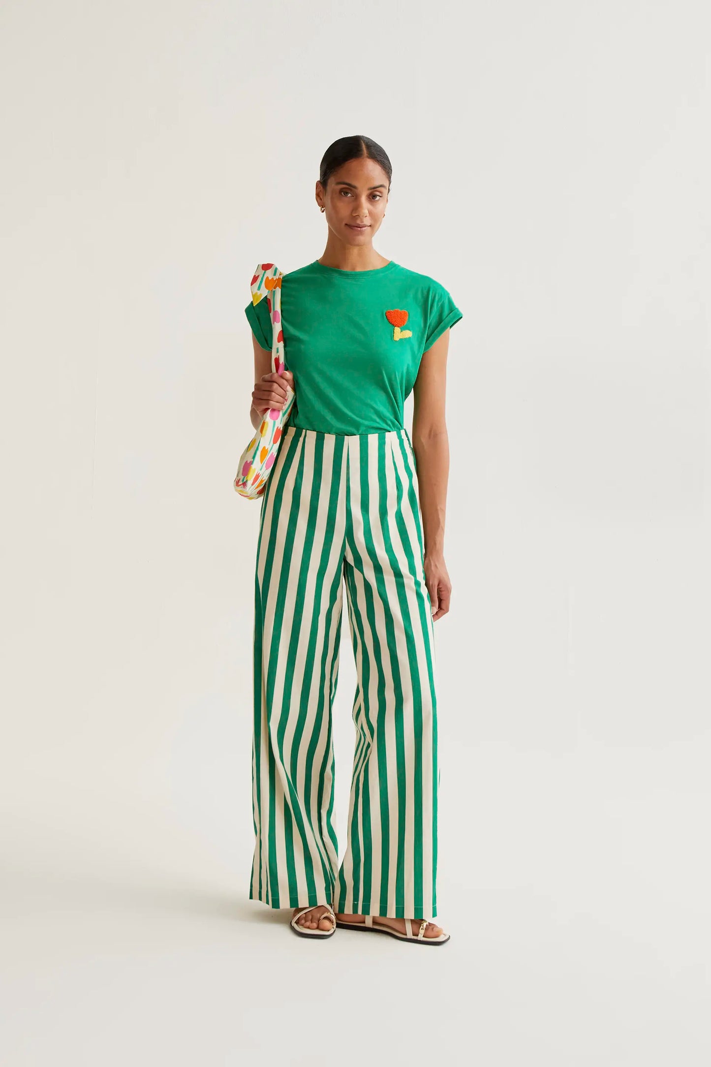 Green t-shirt with red tulip embroidery