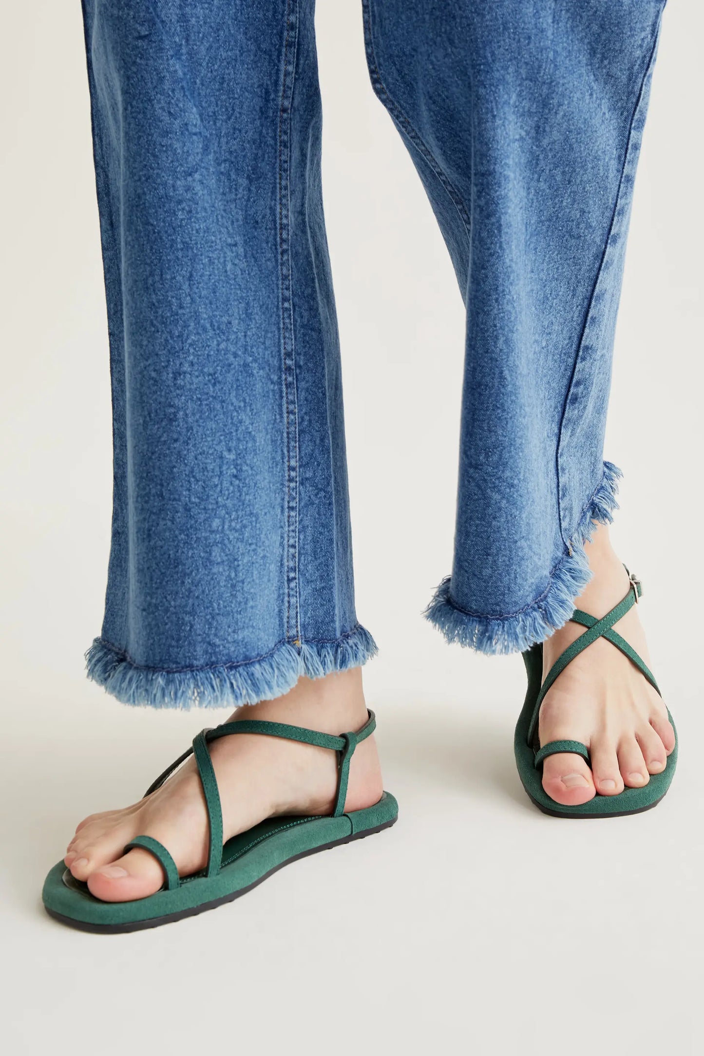 Blue jeans with raw-cut hem
