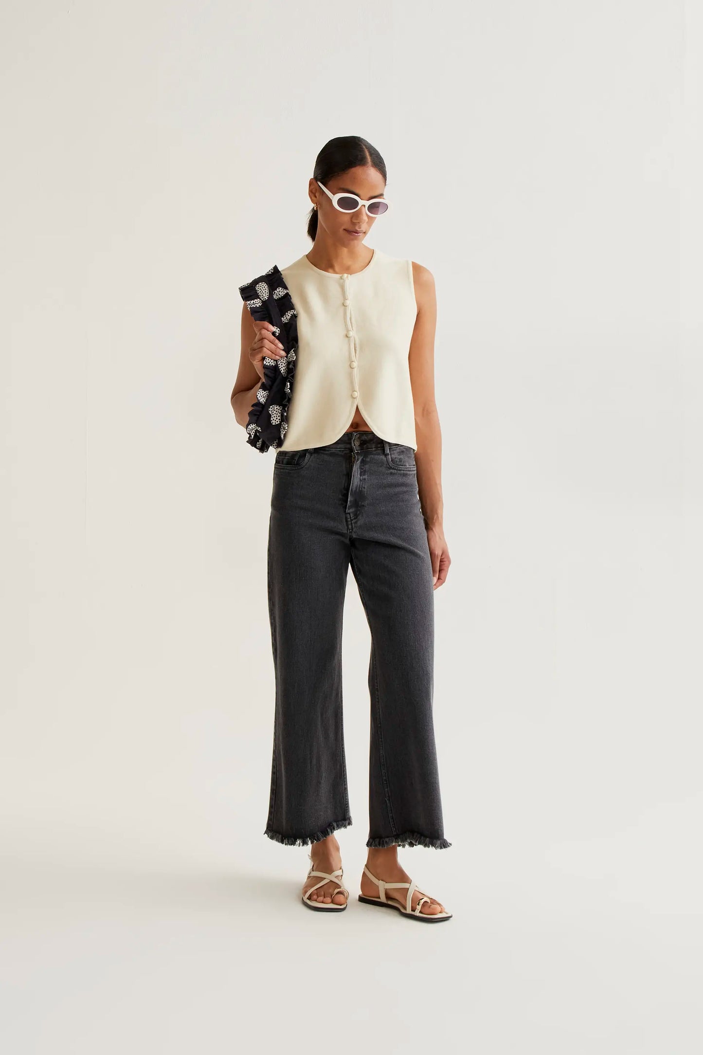 Black jeans with raw-cut hem