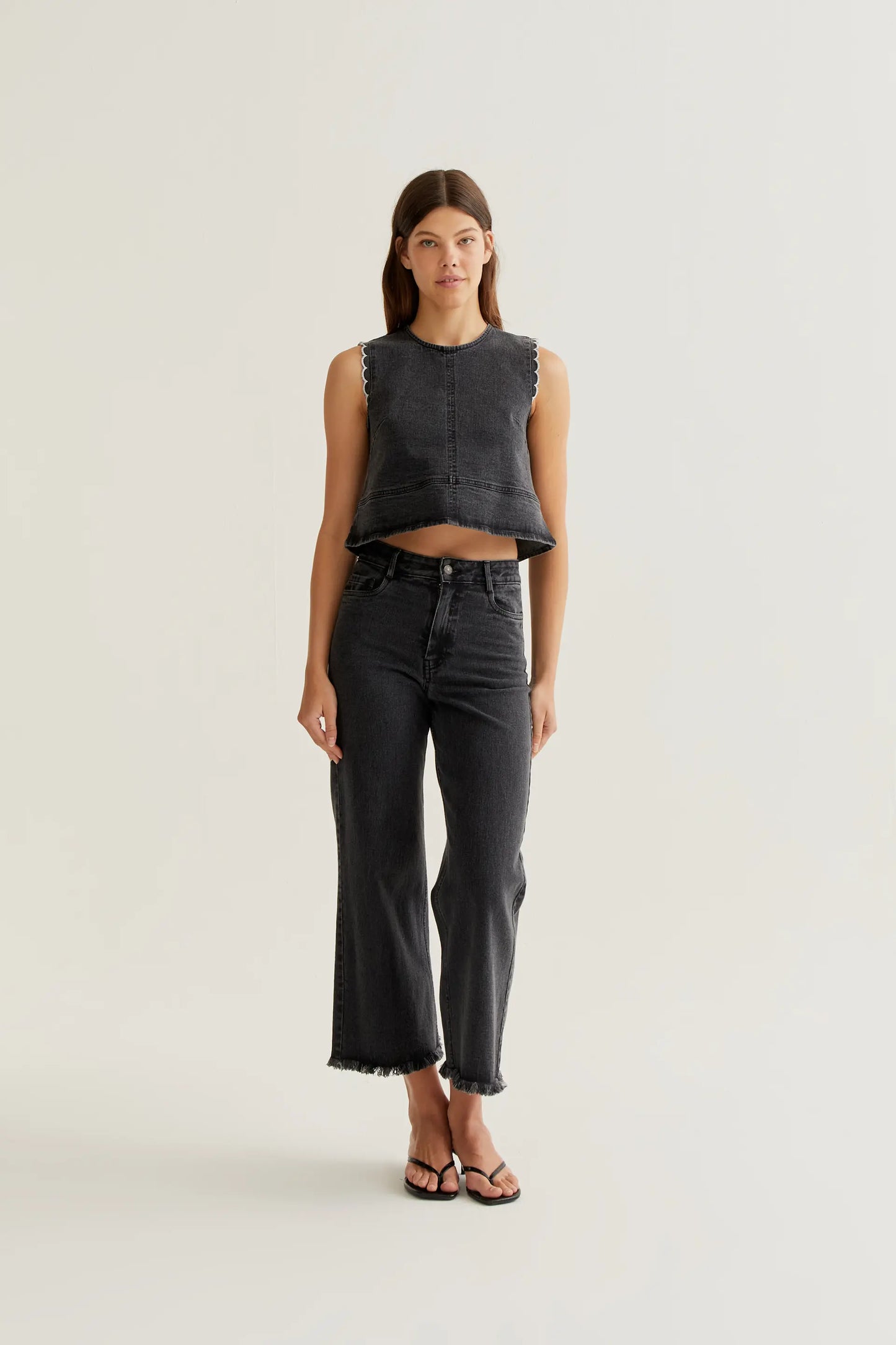 Black denim top with wavy details