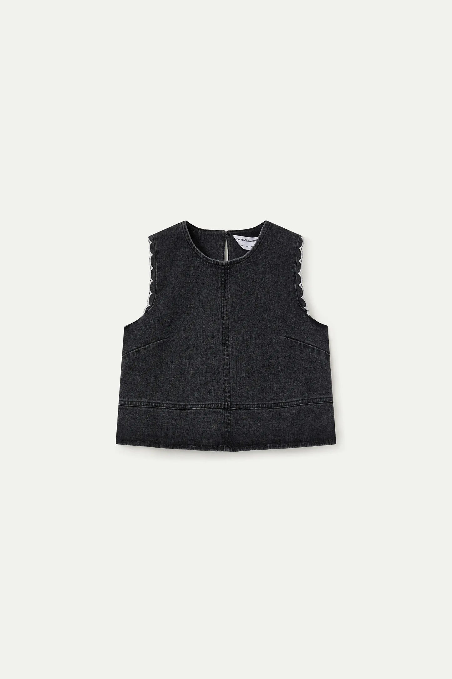 Black denim top with wavy details