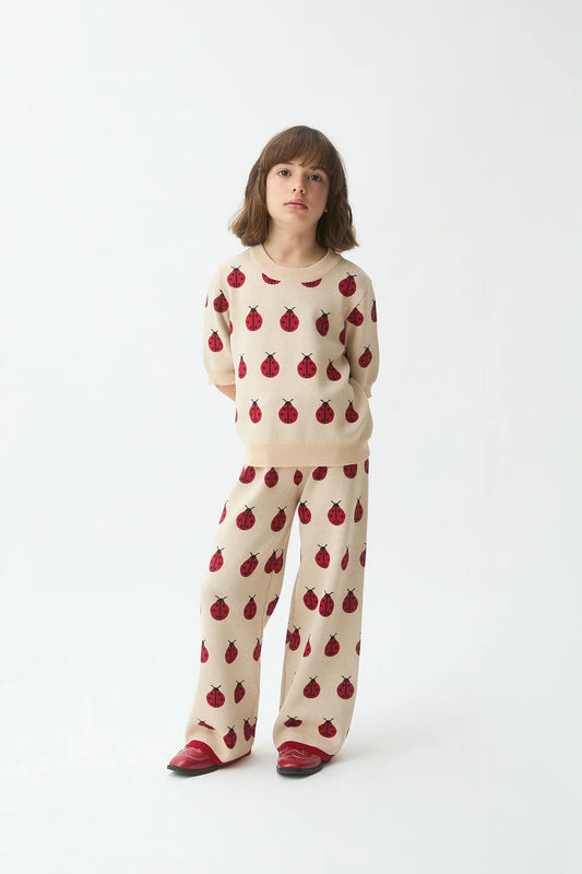 Pantalón punto jacquard de niña con estampado Red Coccinella