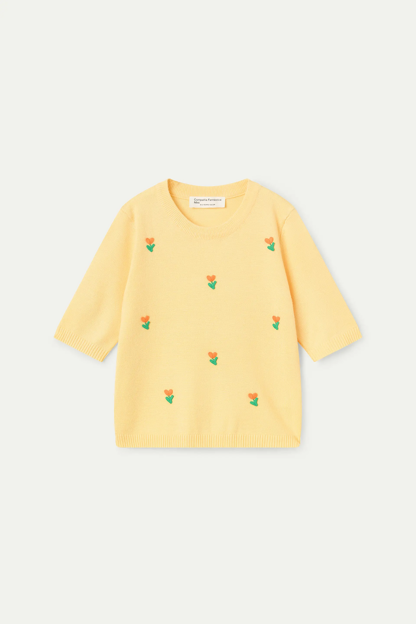 Top de niña punto amarillo con detalle floral