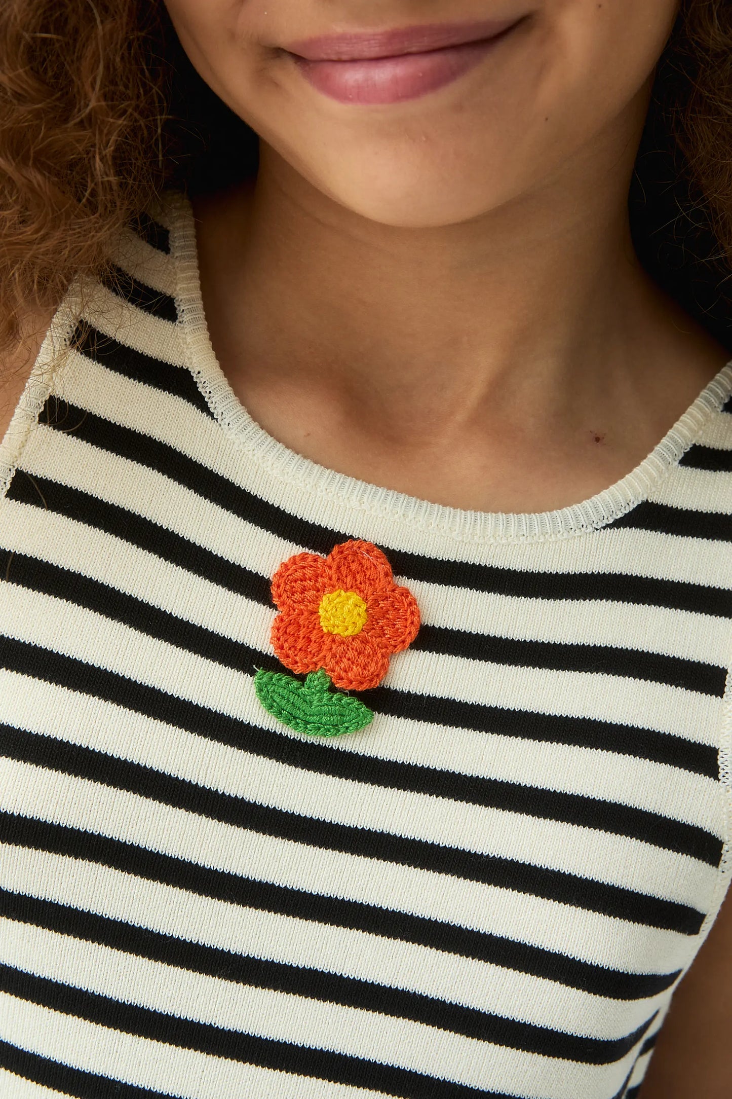 Girl's top with flower embroidery
